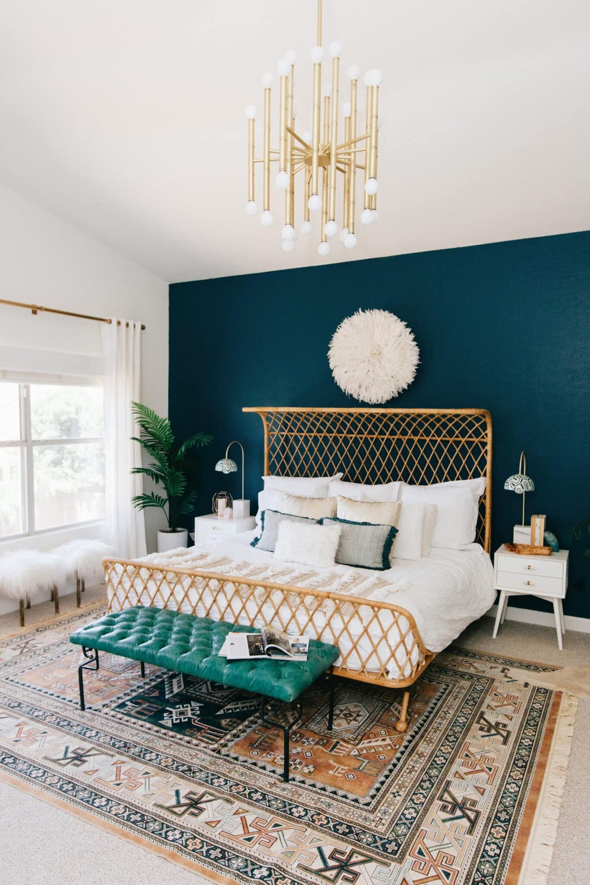 dark teal accent wall in a bedroom - Dunn Edwards Nocturnal Sea