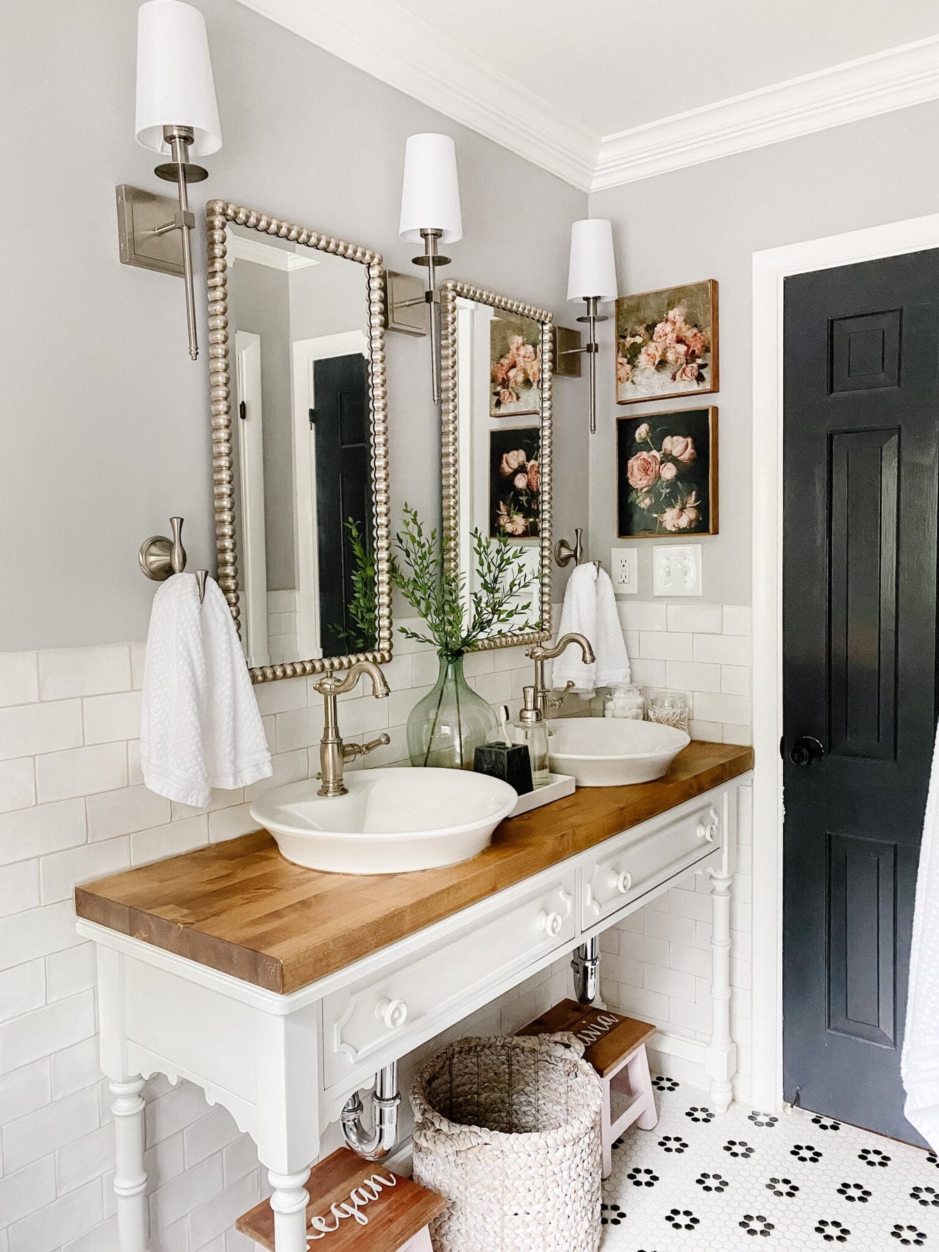 black and white bathroom decor with console table vanity