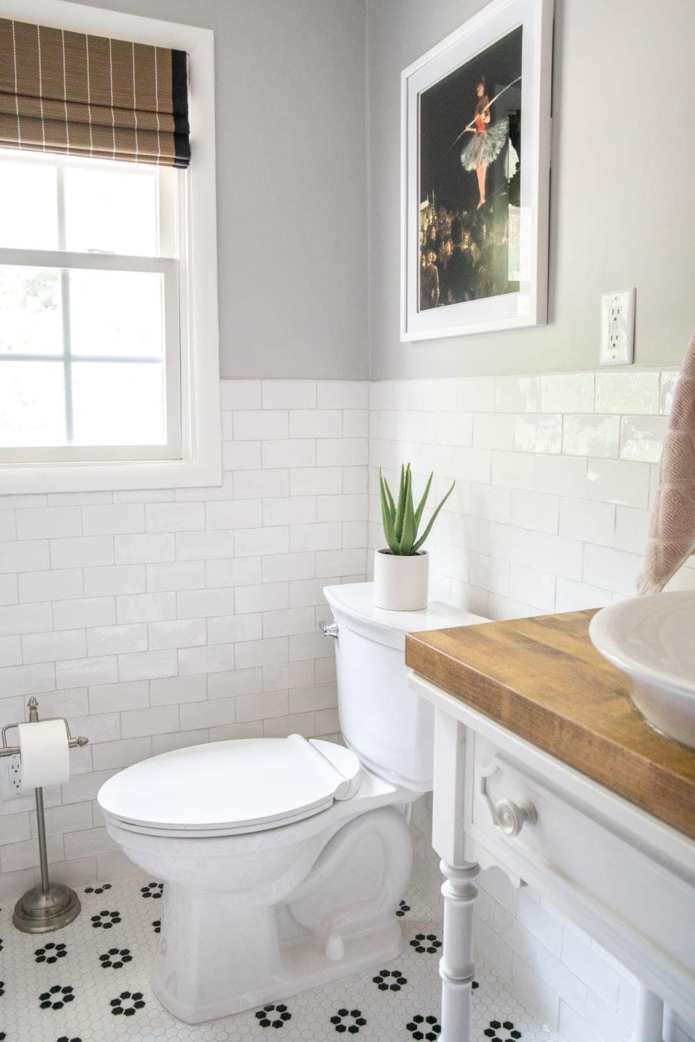 Whimsical, classic kids bathroom makeover | self cleaning toilet and handmade subway tile