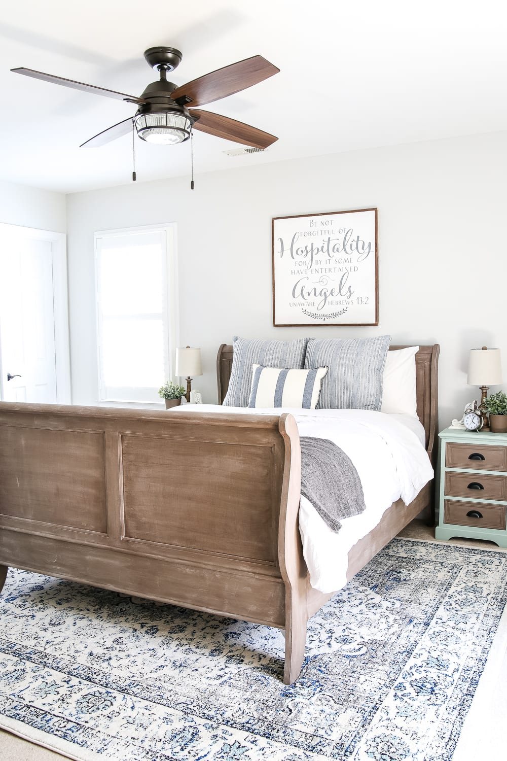 Blue Cottage Style Guest Bedroom Makeover | unigumushane.com - A dark and dated guest bedroom gets a cottage style makeover with serene shades of blue using Craigslist furniture and budget-friendly finds.