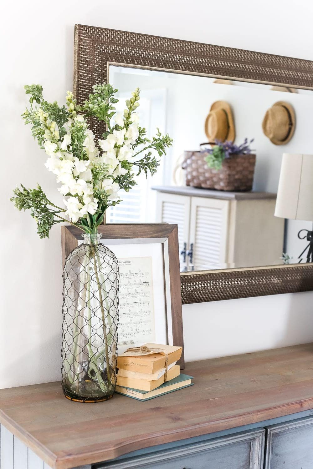 Blue Cottage Style Guest Bedroom Makeover | unigumushane.com - A dark and dated guest bedroom gets a cottage style makeover with serene shades of blue using Craigslist furniture and budget-friendly finds.