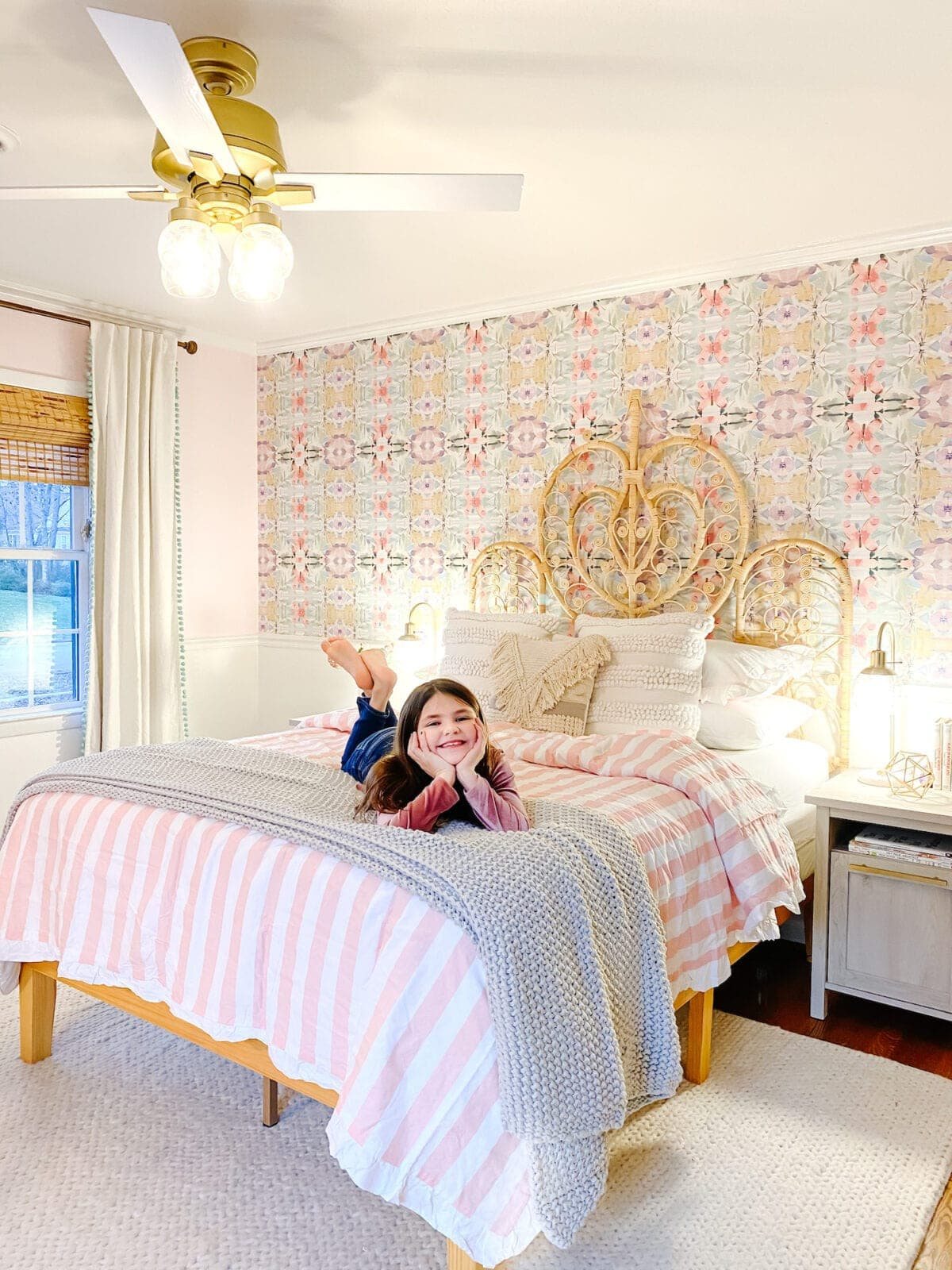 A little girl bedroom gets a big girl update using a few boho furniture swaps, DIY geology art, and glam accents.