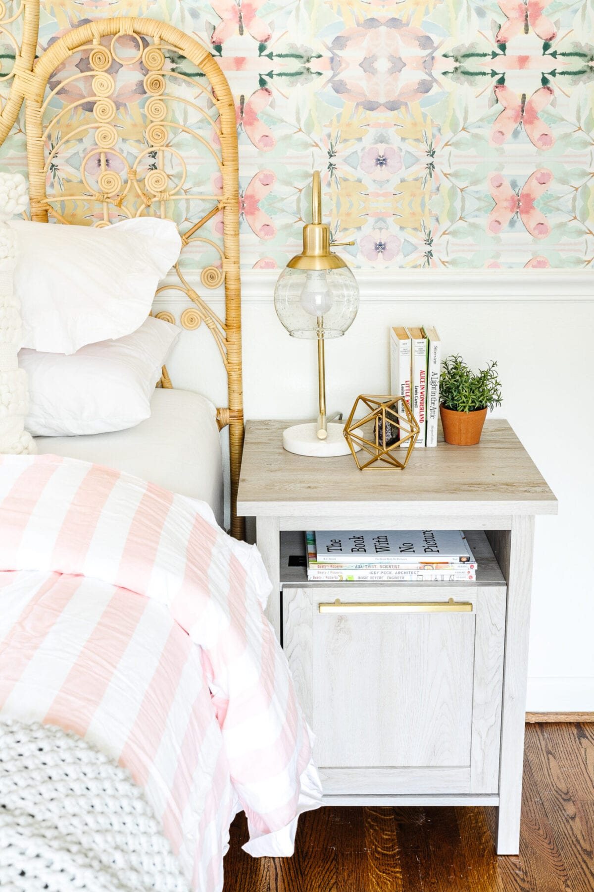 A little girl bedroom gets a big girl update using a few boho furniture swaps, DIY geology art, and glam accents.