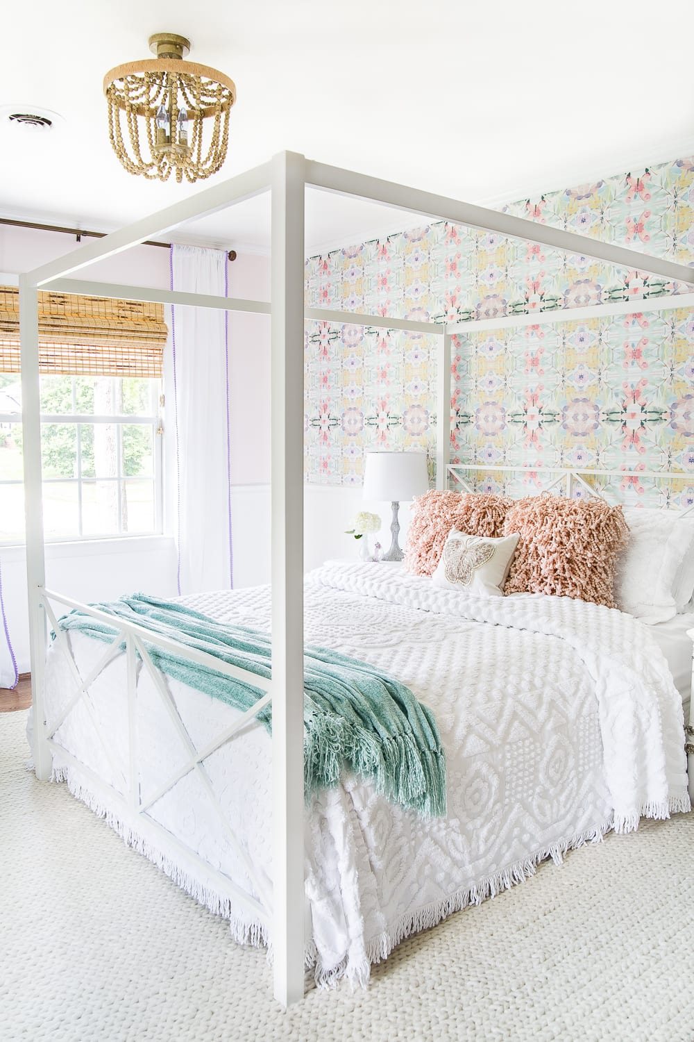 A little girl bedroom gets a big girl update using a few boho furniture swaps, DIY geology art, and glam accents.