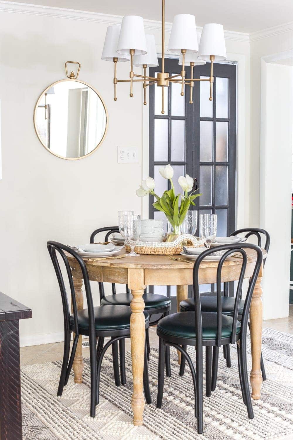 How a small, oddly laid out breakfast nook entryway got a makeover to maximize on storage, function, traffic flow, and modern style.