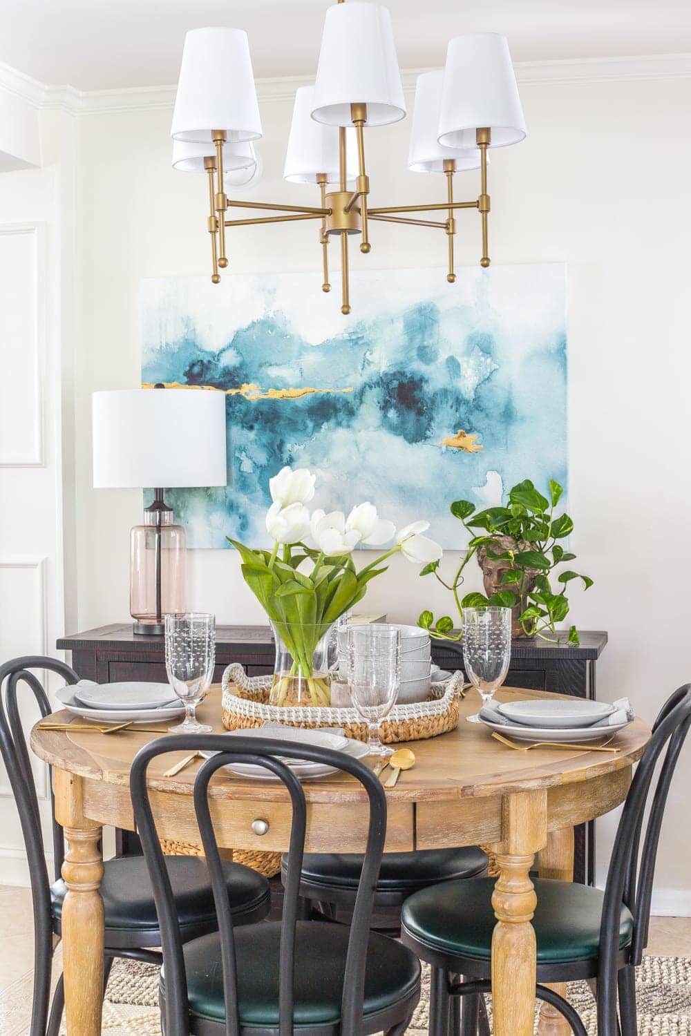 How a small, oddly laid out breakfast nook entryway got a makeover to maximize on storage, function, traffic flow, and modern style.