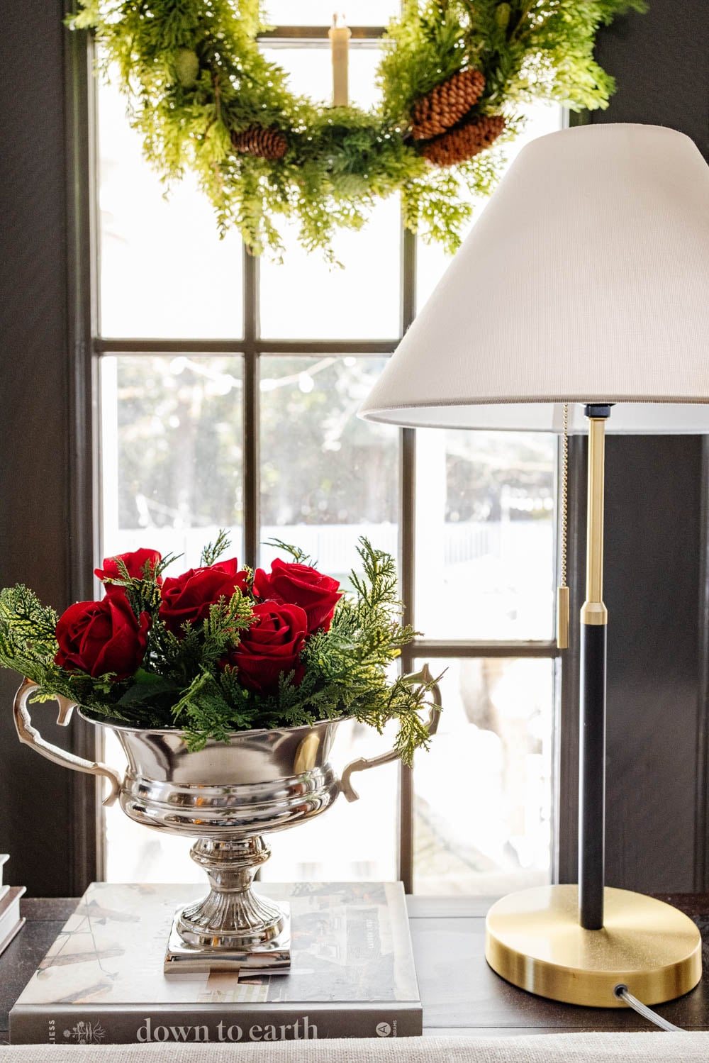 Ralph Lauren Christmas decorating ideas on a budget - silver urn of red roses and pine stems