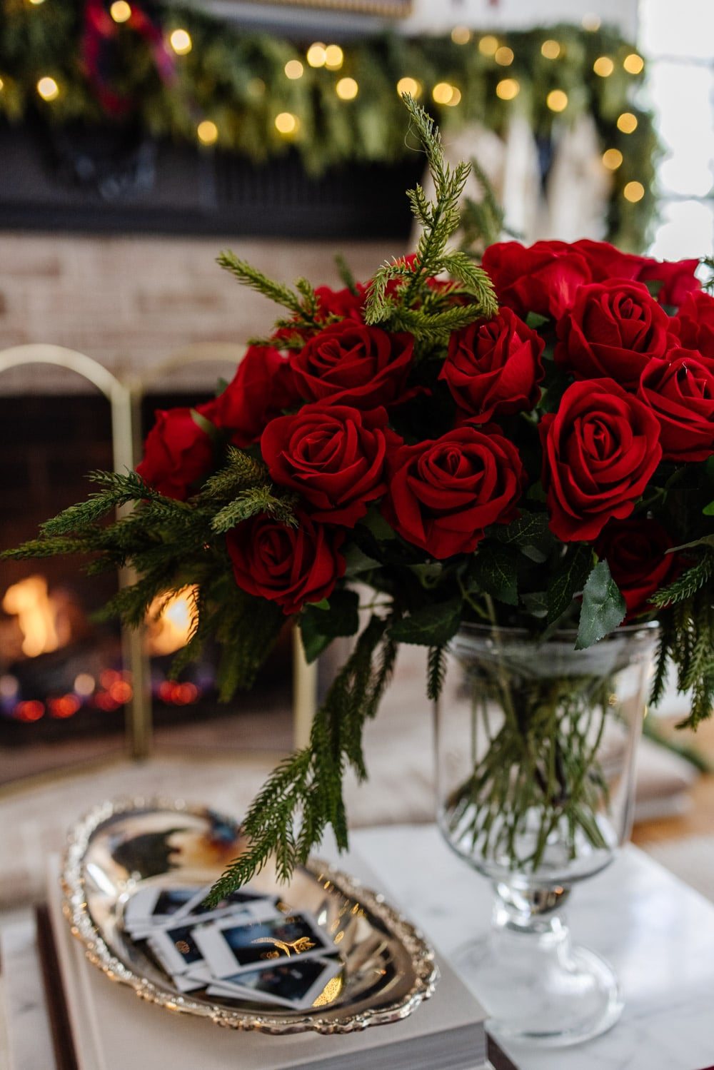 Ralph Lauren Christmas decorating ideas on a budget - red roses mixed with winter stems