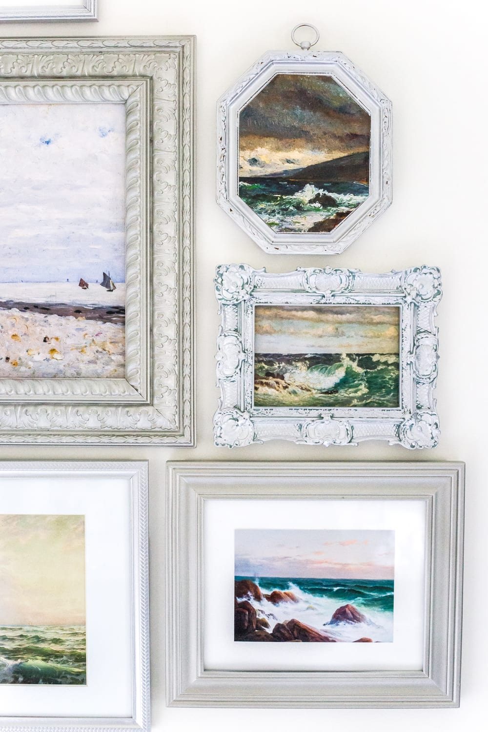 Budget Master Bathroom Refresh Reveal | corner gallery wall with thrifted frames and free coastal art printables