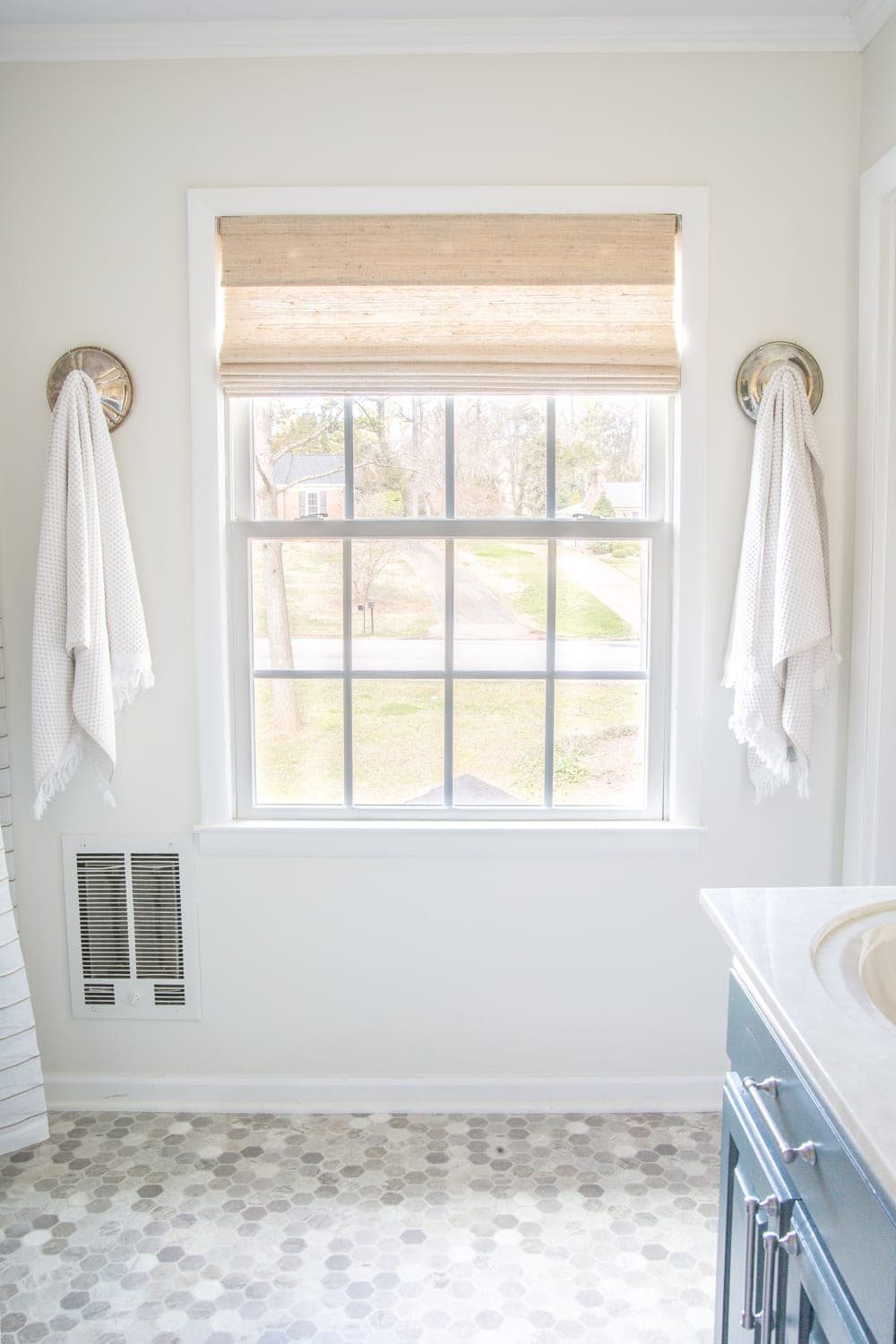 Budget Master Bathroom Refresh Reveal | window shade and sheet vinyl flooring