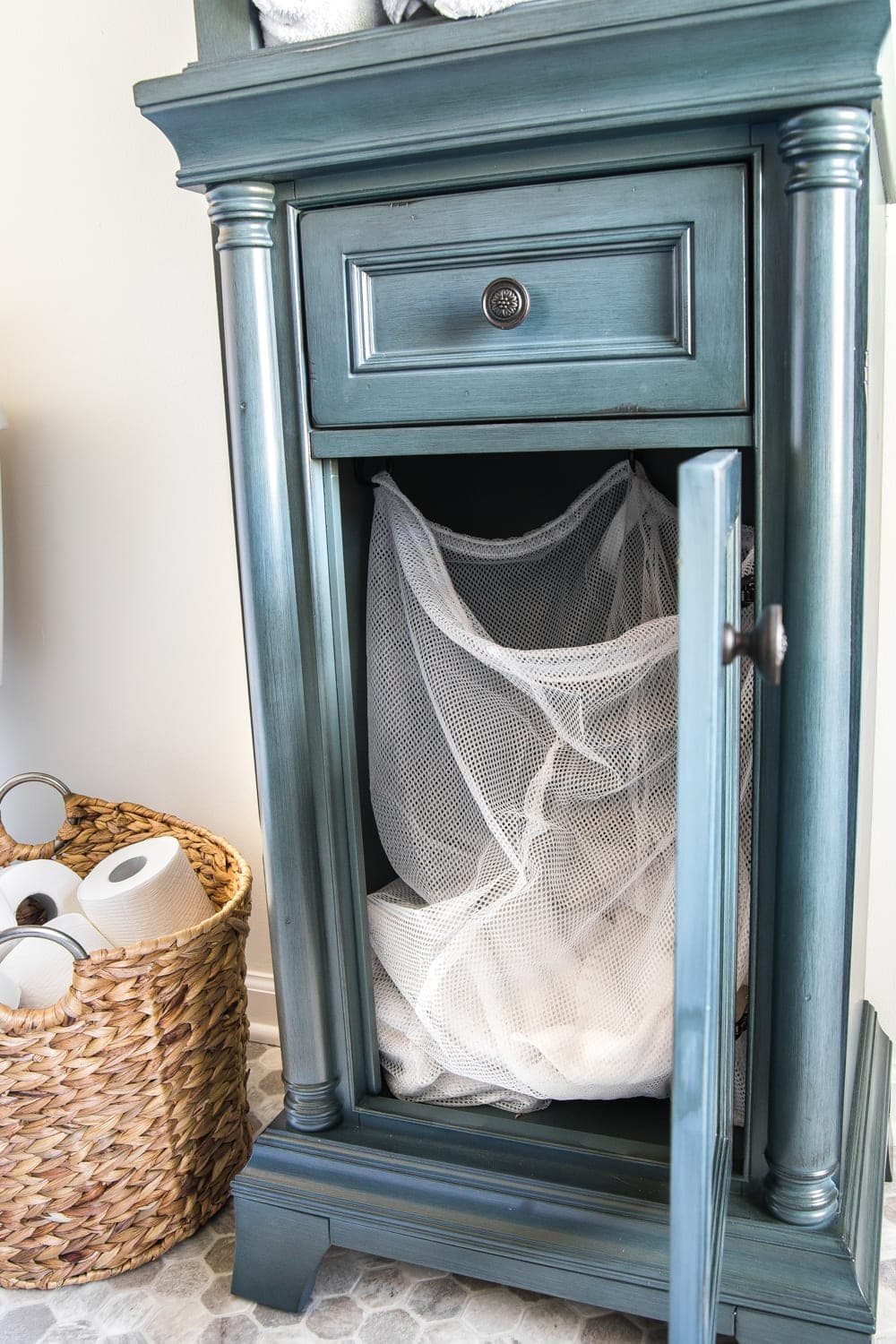 Budget Master Bathroom Refresh Reveal | linen cabinet organization