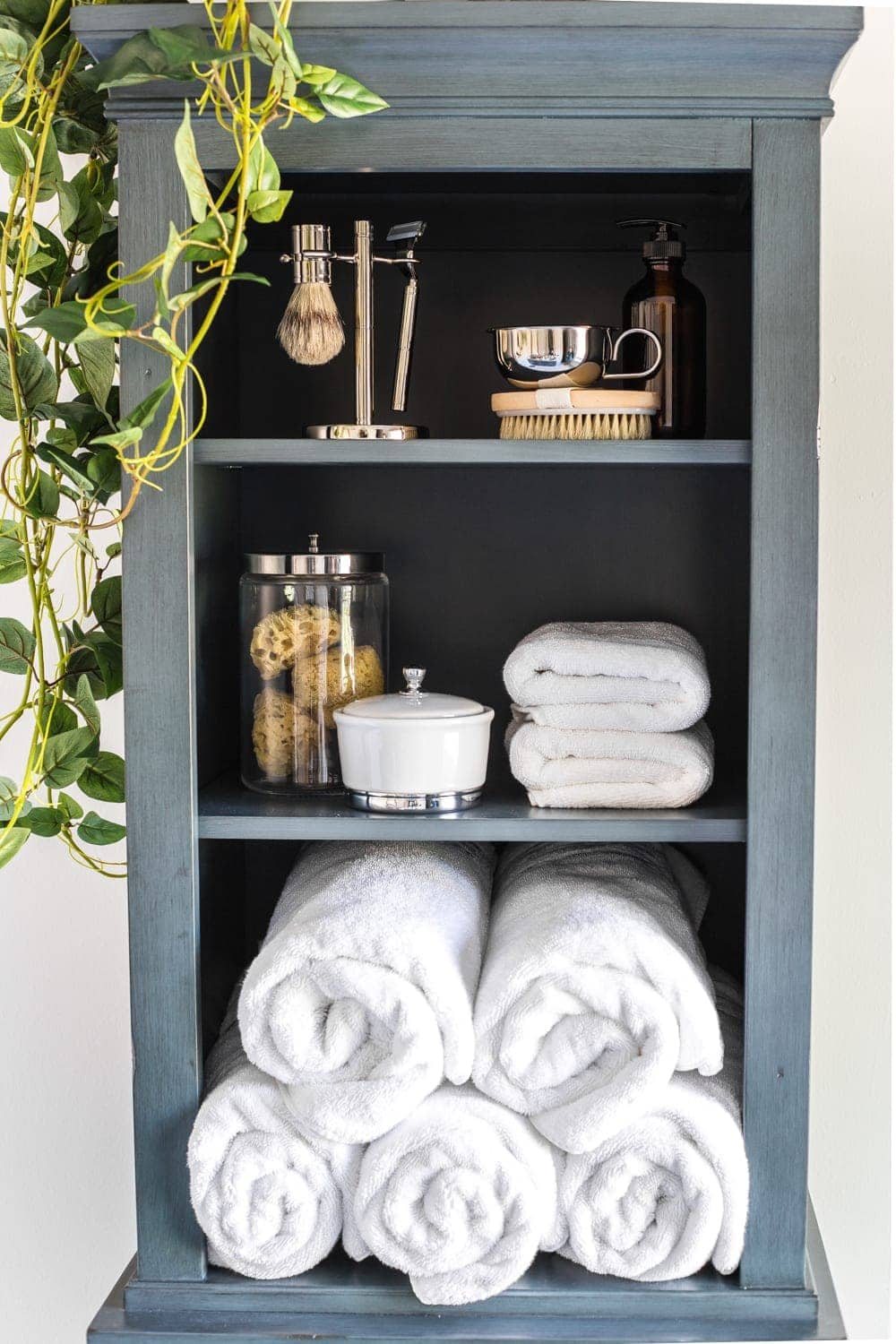 Budget Master Bathroom Refresh Reveal | linen cabinet organization