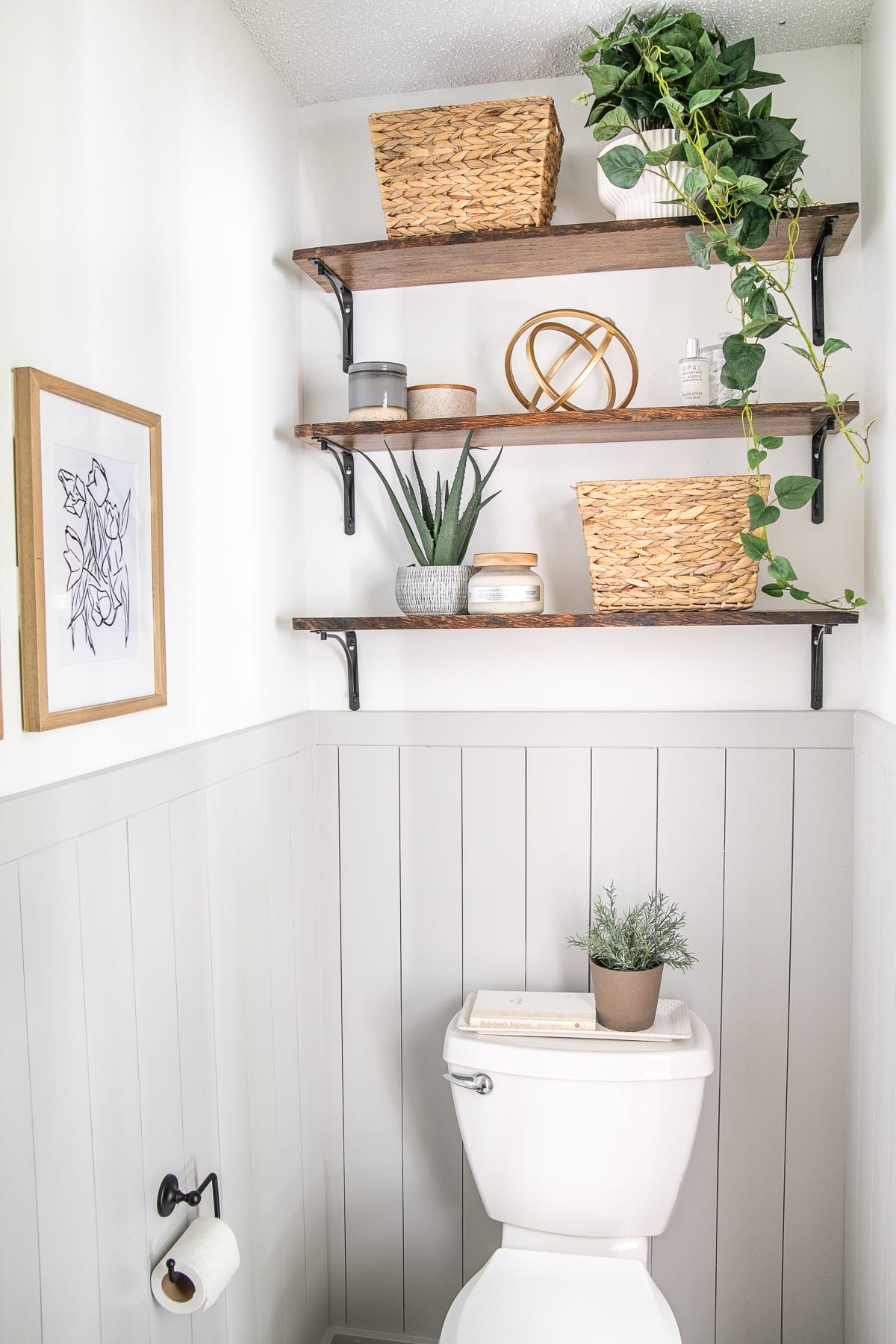 shelves above toilet in small bathroom