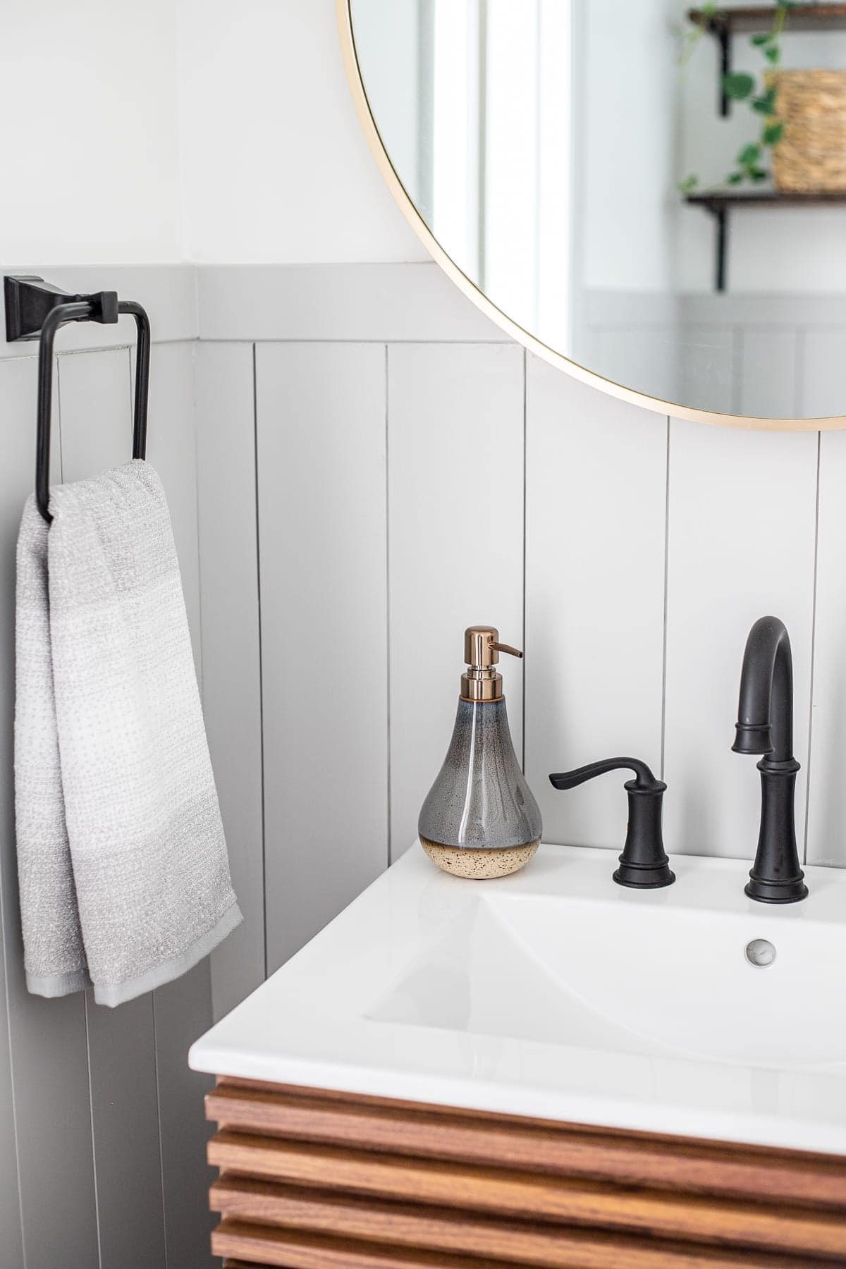 powder room decor and vertical gray shiplap