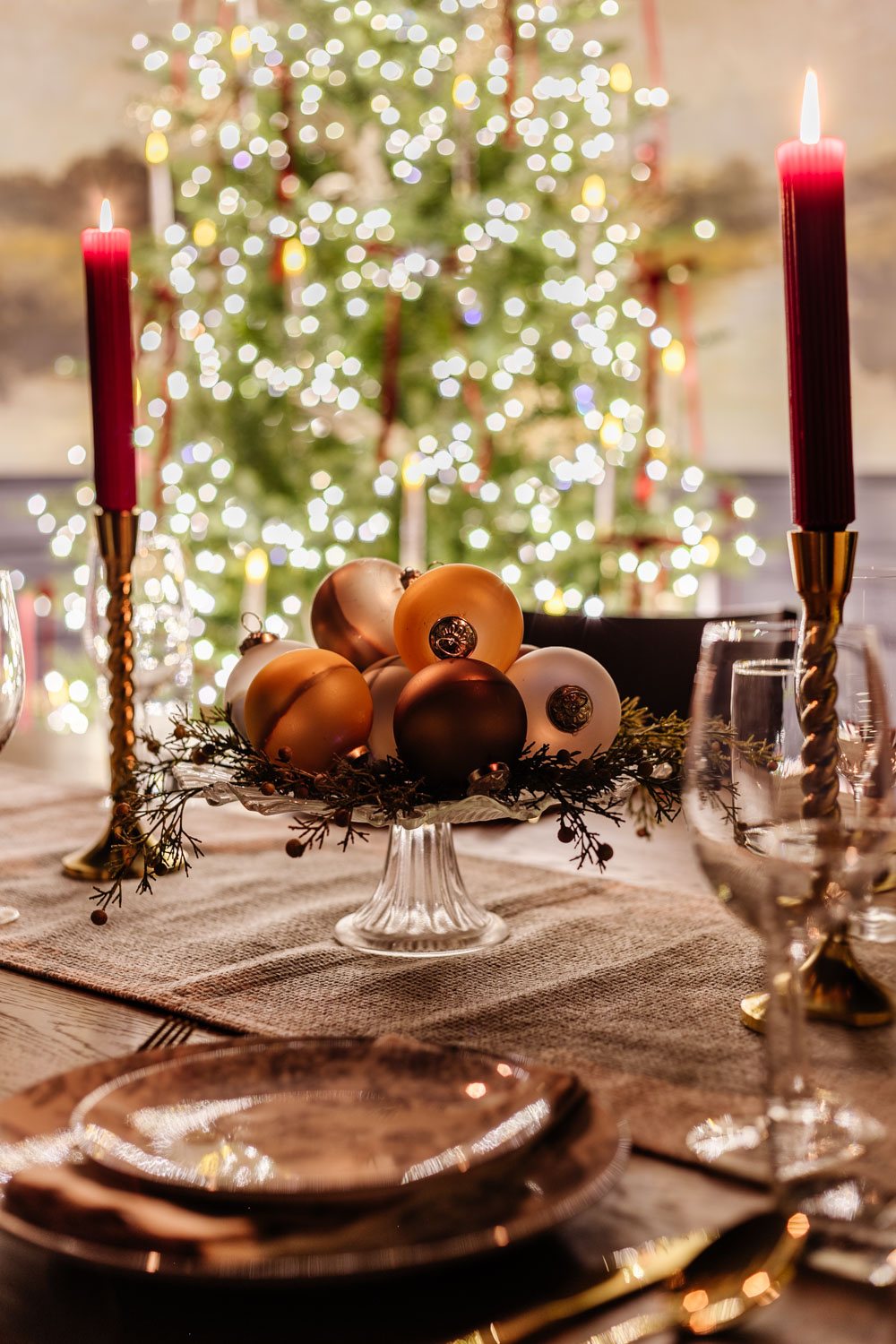 candlelight Christmas dining room table with centerpiece
