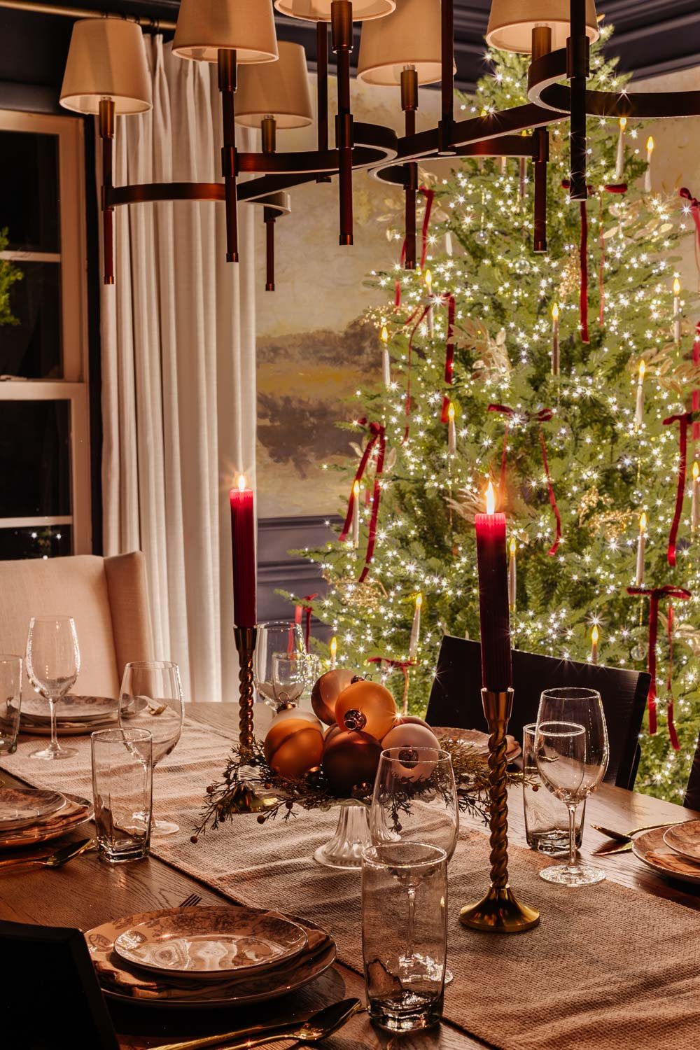 candlelight Christmas dining room table with centerpiece
