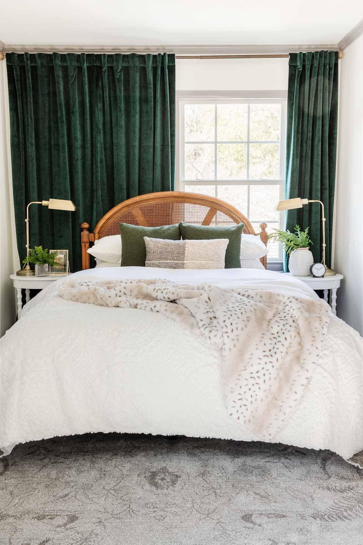 green and white Christmas bedding in a cozy winter bedroom