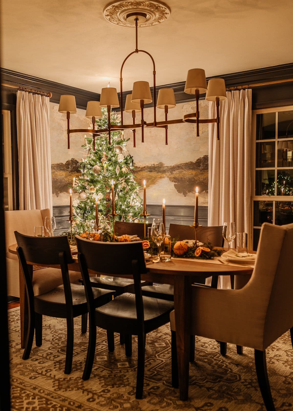 Christmas candlelight in dining room with table decor