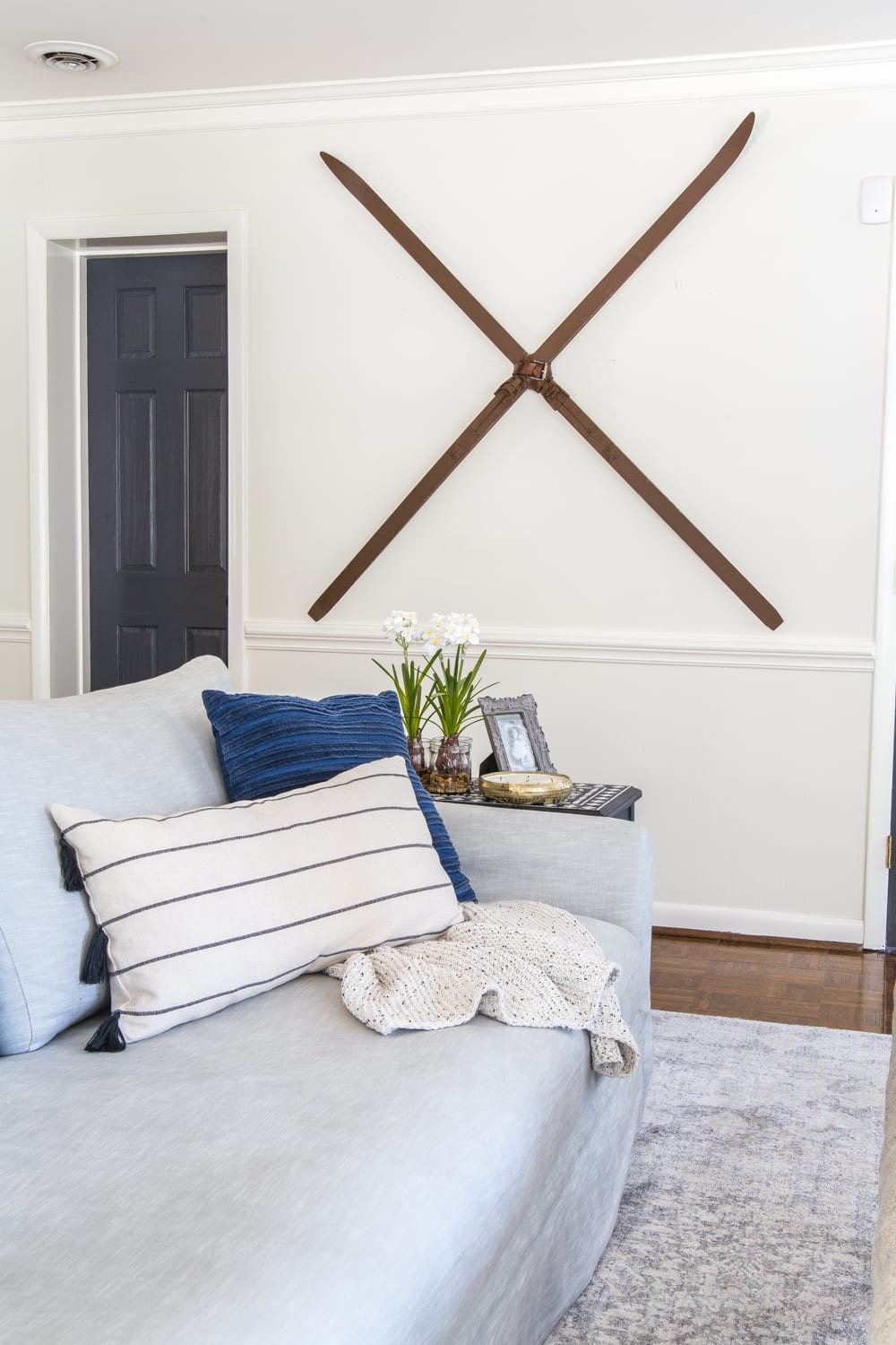 Christmas wall decor idea using snow skis hung on a wall