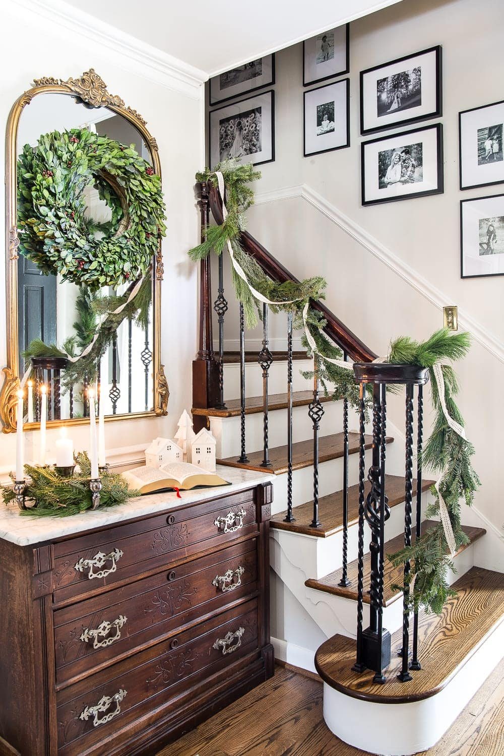 Classic Christmas Foyer | unigumushane.com - A classic traditional entryway / foyer decorated for Christmas using fresh pine and holly greenery and a St. Lucia Day Advent wreath. #christmasfoyer #classicdecor #traditionalchristmas
