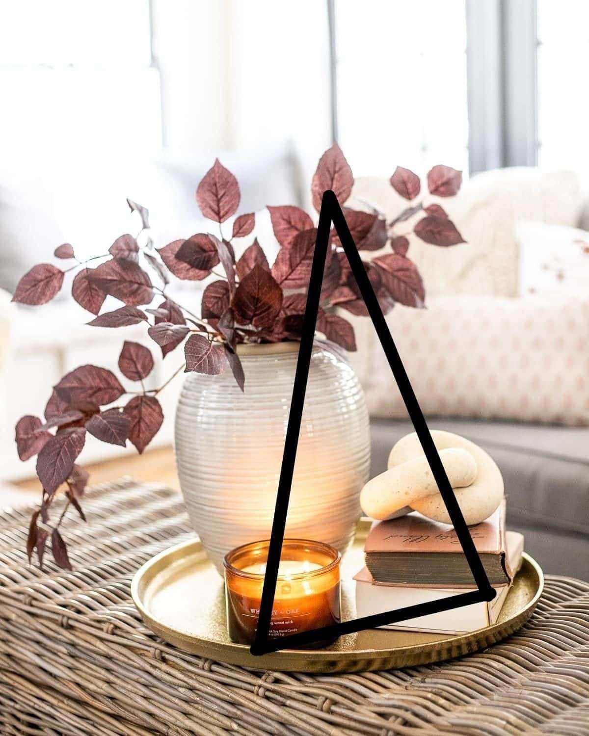 the decorator's triangle on a coffee table vignette