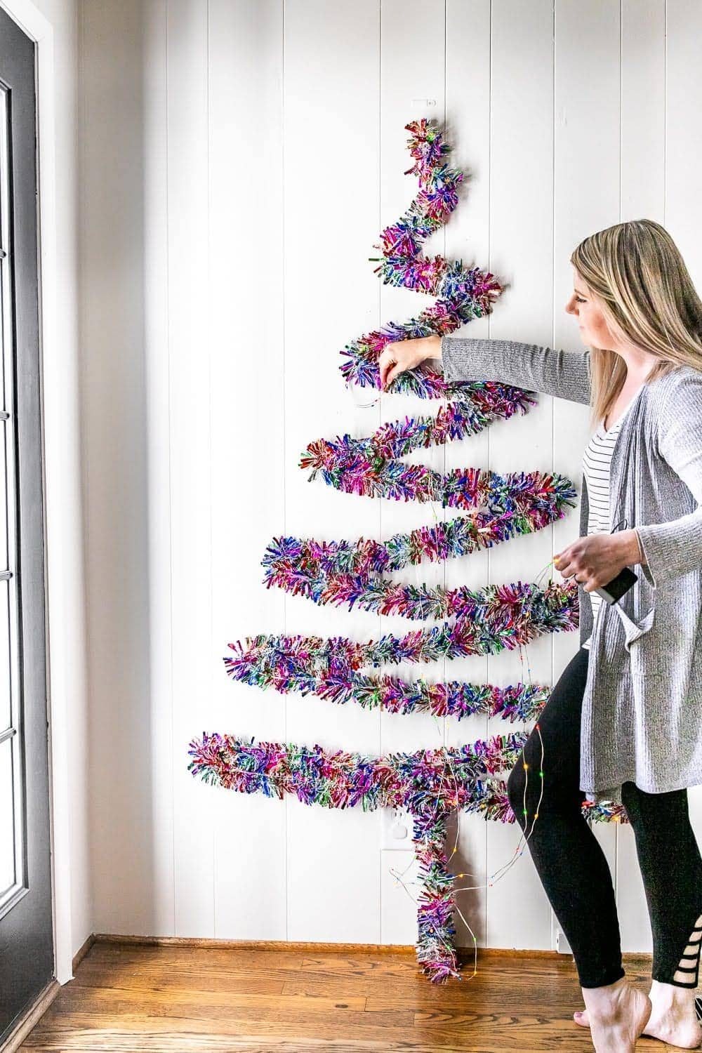 adding lights to a wall Christmas tree