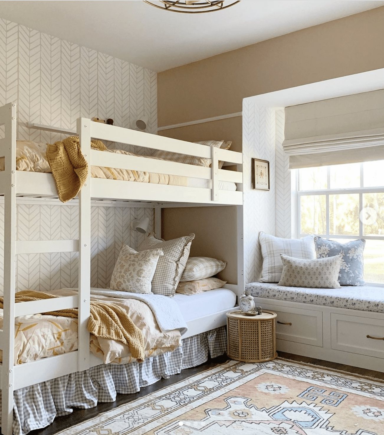 blush pink shared bedroom for girls with eclectic bedding