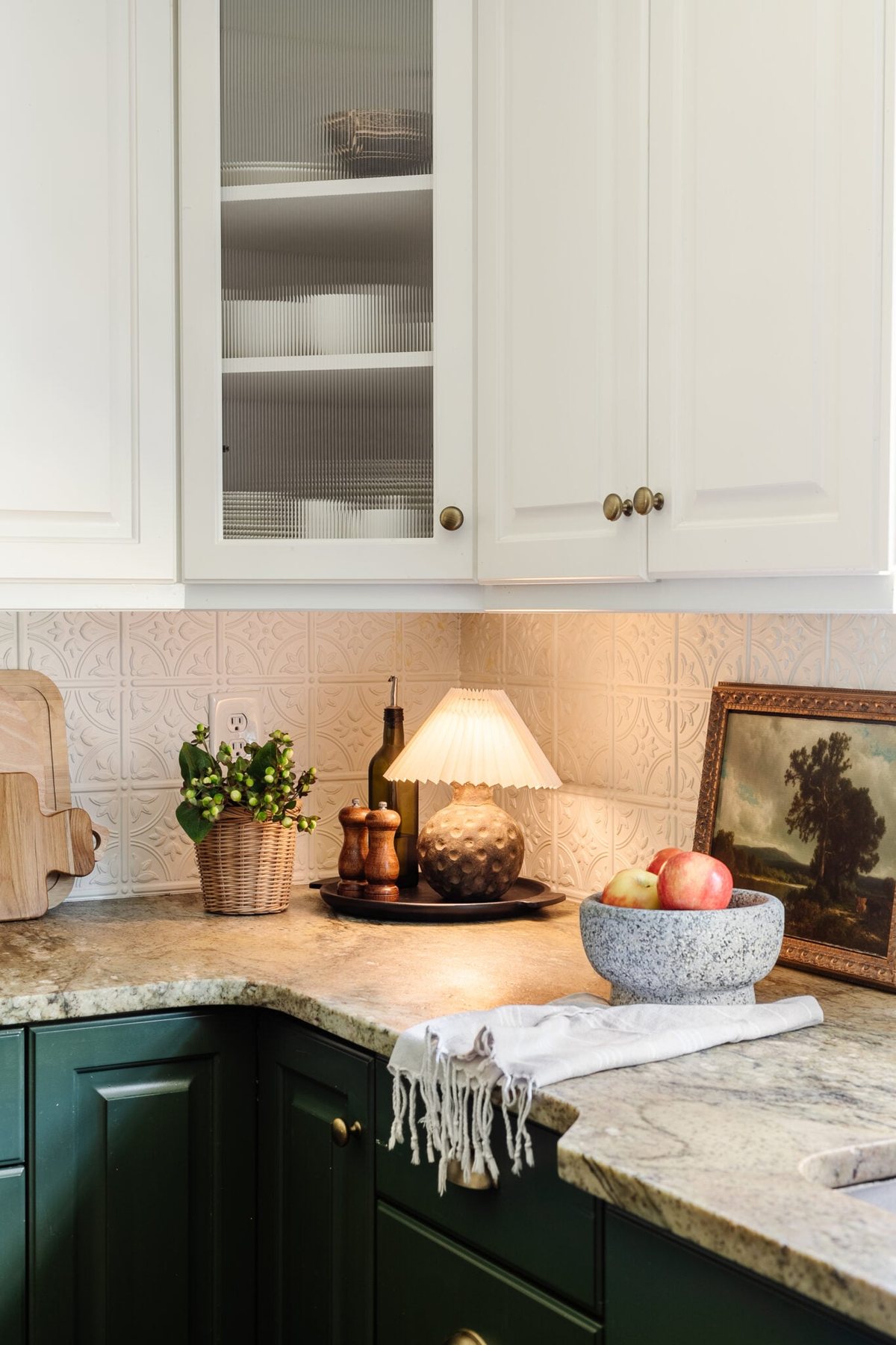 cordless DIY mini lamp on a kitchen countertop with bowl of apples, kitchen art, and planter