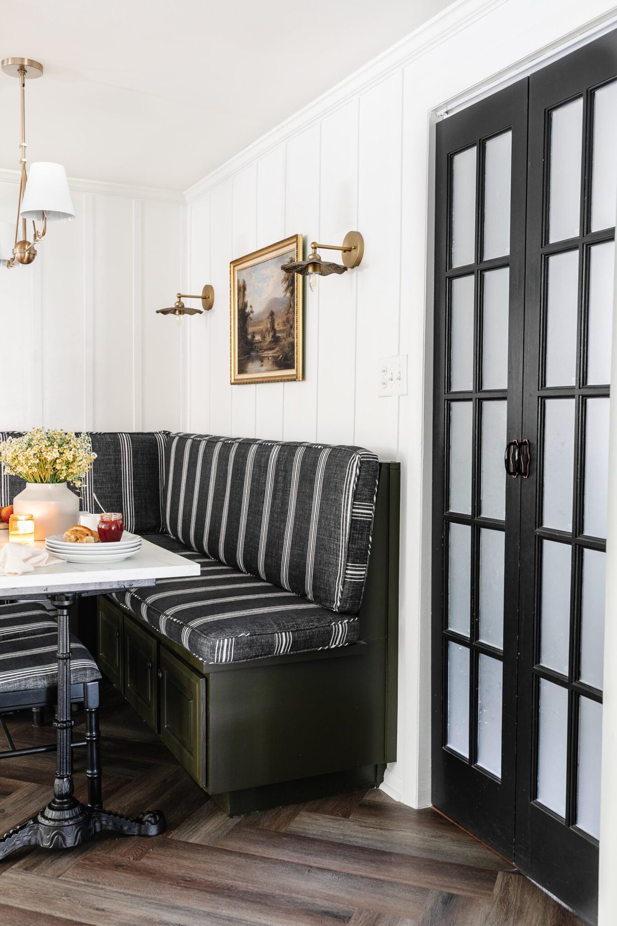 bifold French doors next to a breakfast nook