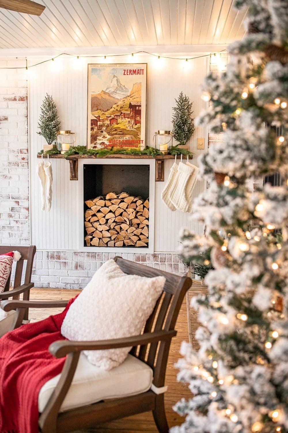 Faux fireplace with wood stack and cozy Christmas decor