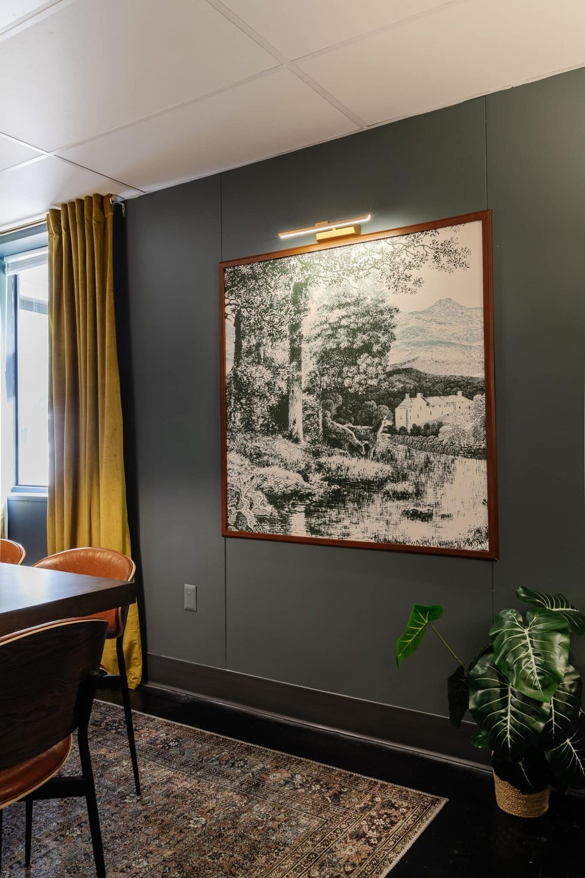 DIY memo board made to look like large wall art in a conference room