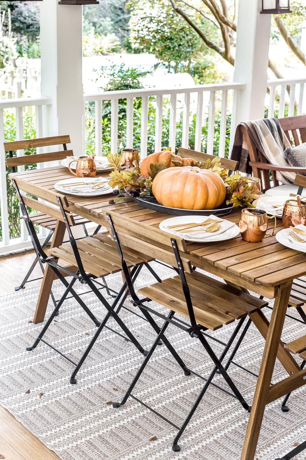 Cozy fall back porch outdoor entertaining dining