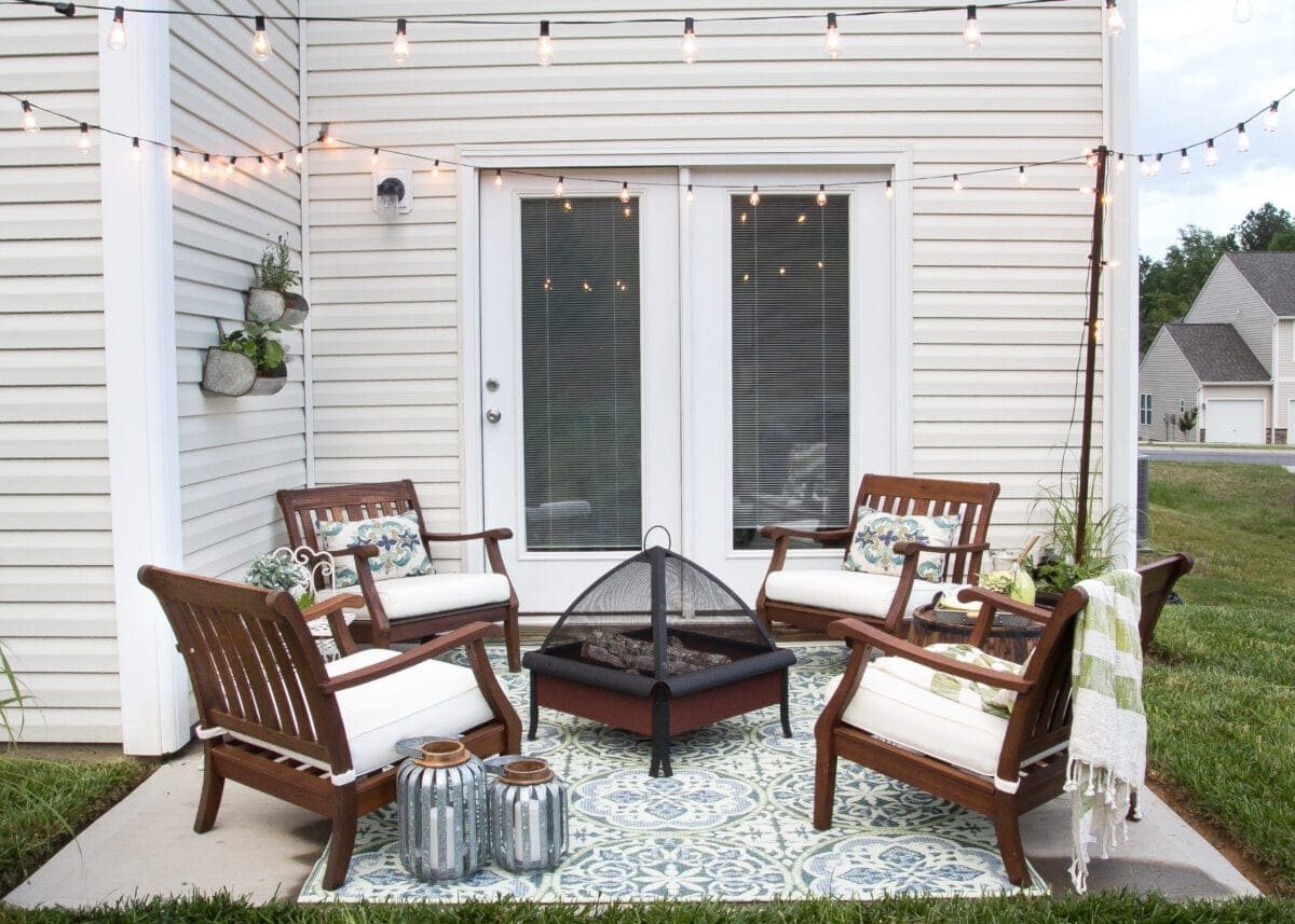 How to Decorate a Small Patio | unigumushane.com - Utilize a small patio space with chairs at each corner and a fire pit in the middle for function and entertainment. Add outdoor string lights for a cozy ambience.