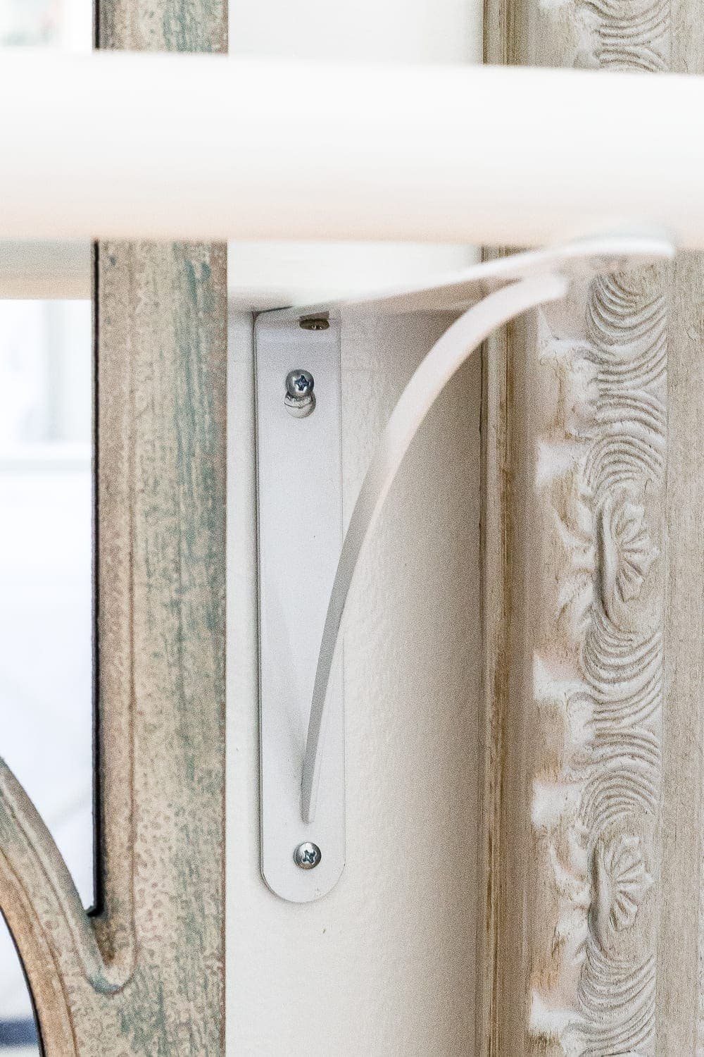 How to make a ballet barre with mirrors and shelf brackets and how to hang wall decor on a chair rail, board and batten, or molding #balletbarre #kidsdecor #girldecor #girlbedroom #girlroom #kidsroom #walldecor #hanginghack #wallhack #diywalldecor