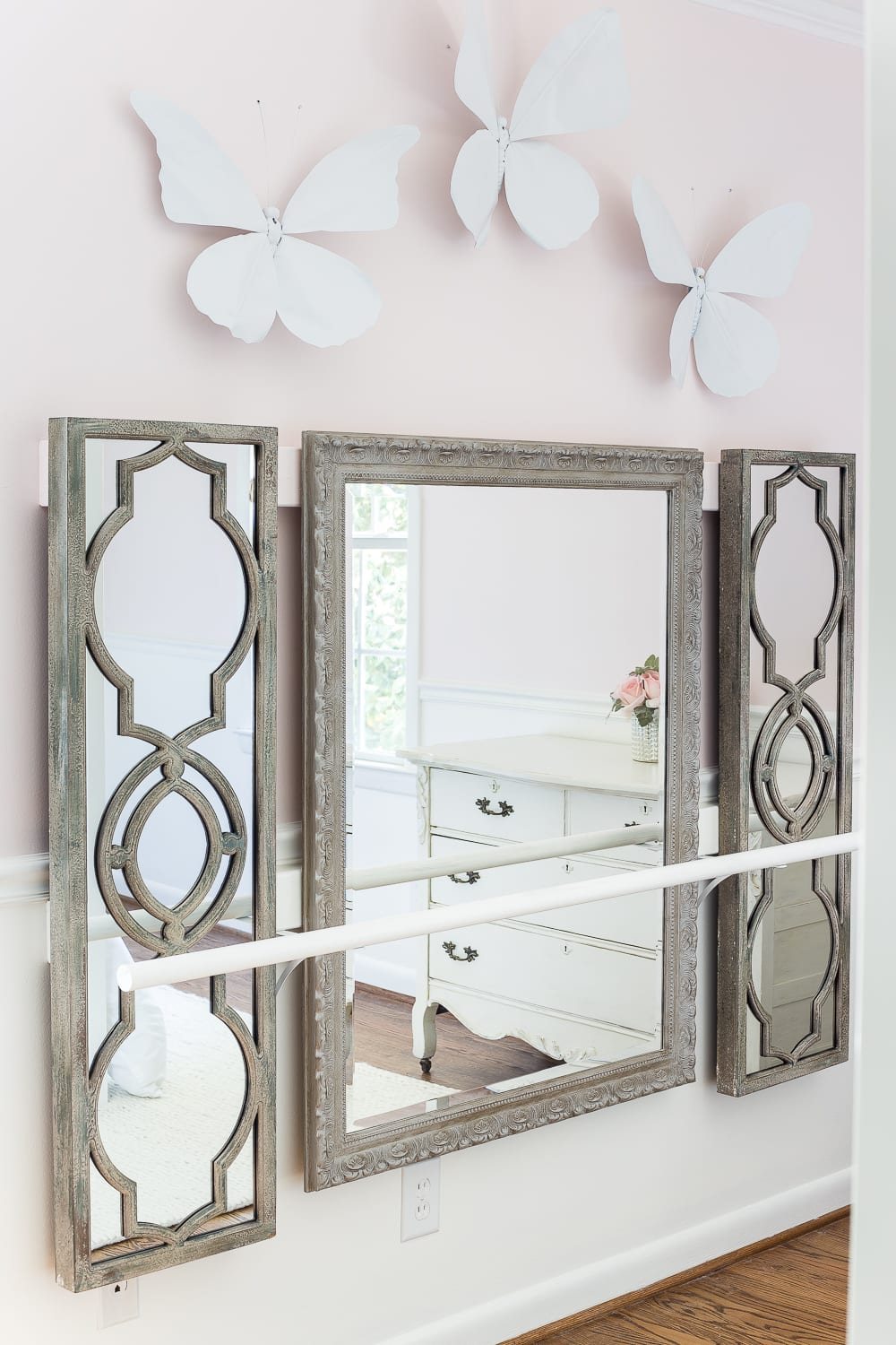 How to make a ballet barre with mirrors and shelf brackets and how to hang wall decor on a chair rail, board and batten, or molding #balletbarre #kidsdecor #girldecor #girlbedroom #girlroom #kidsroom #walldecor #hanginghack #wallhack #diywalldecor