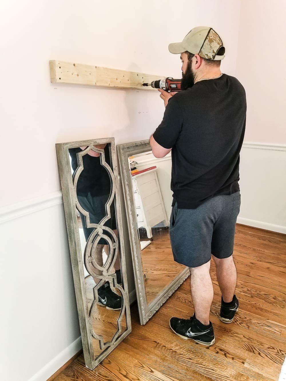 How to make a ballet barre with mirrors and shelf brackets and how to hang wall decor on a chair rail, board and batten, or molding #balletbarre #kidsdecor #girldecor #girlbedroom #girlroom #kidsroom #walldecor #hanginghack #wallhack #diywalldecor