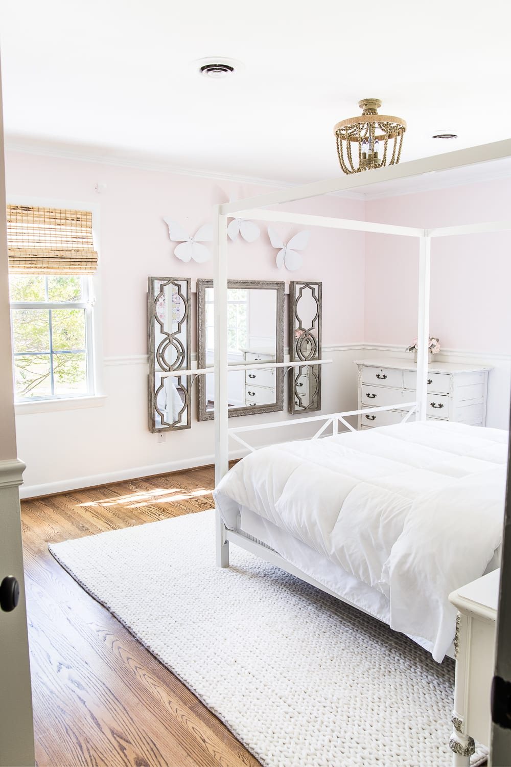 How to make a ballet barre with mirrors and shelf brackets and how to hang wall decor on a chair rail, board and batten, or molding #balletbarre #kidsdecor #girldecor #girlbedroom #girlroom #kidsroom #walldecor #hanginghack #wallhack #diywalldecor