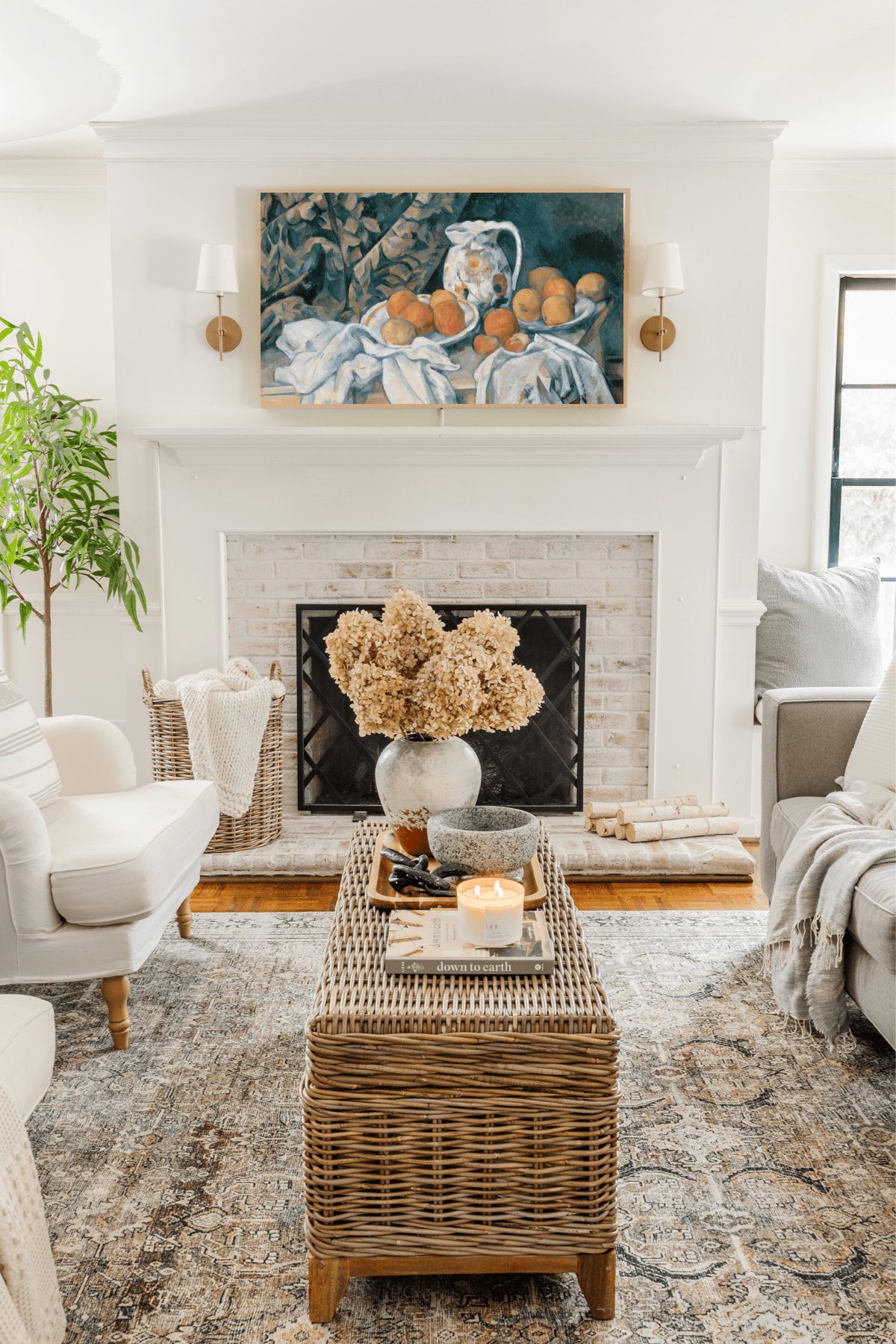 limewashed fireplace in a living room with a Samsung Frame TV