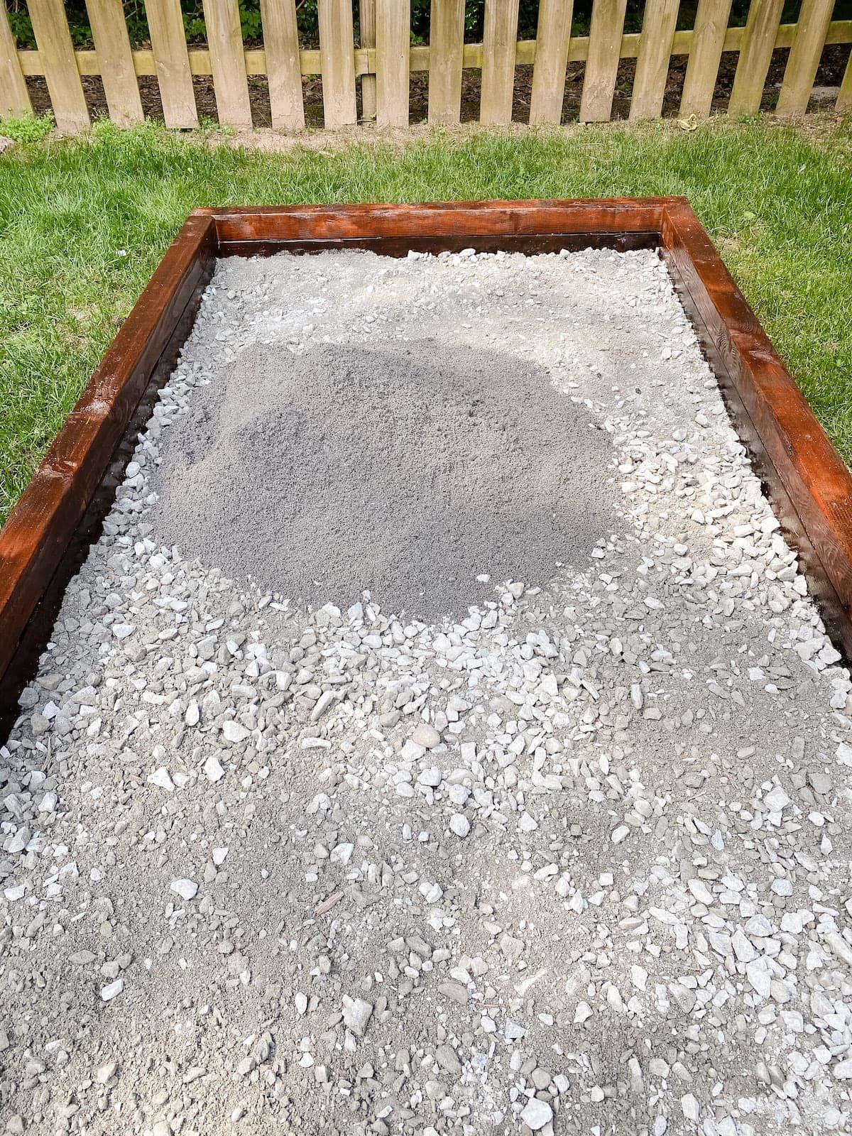 spreading screen washing and paver base for bocce ball court