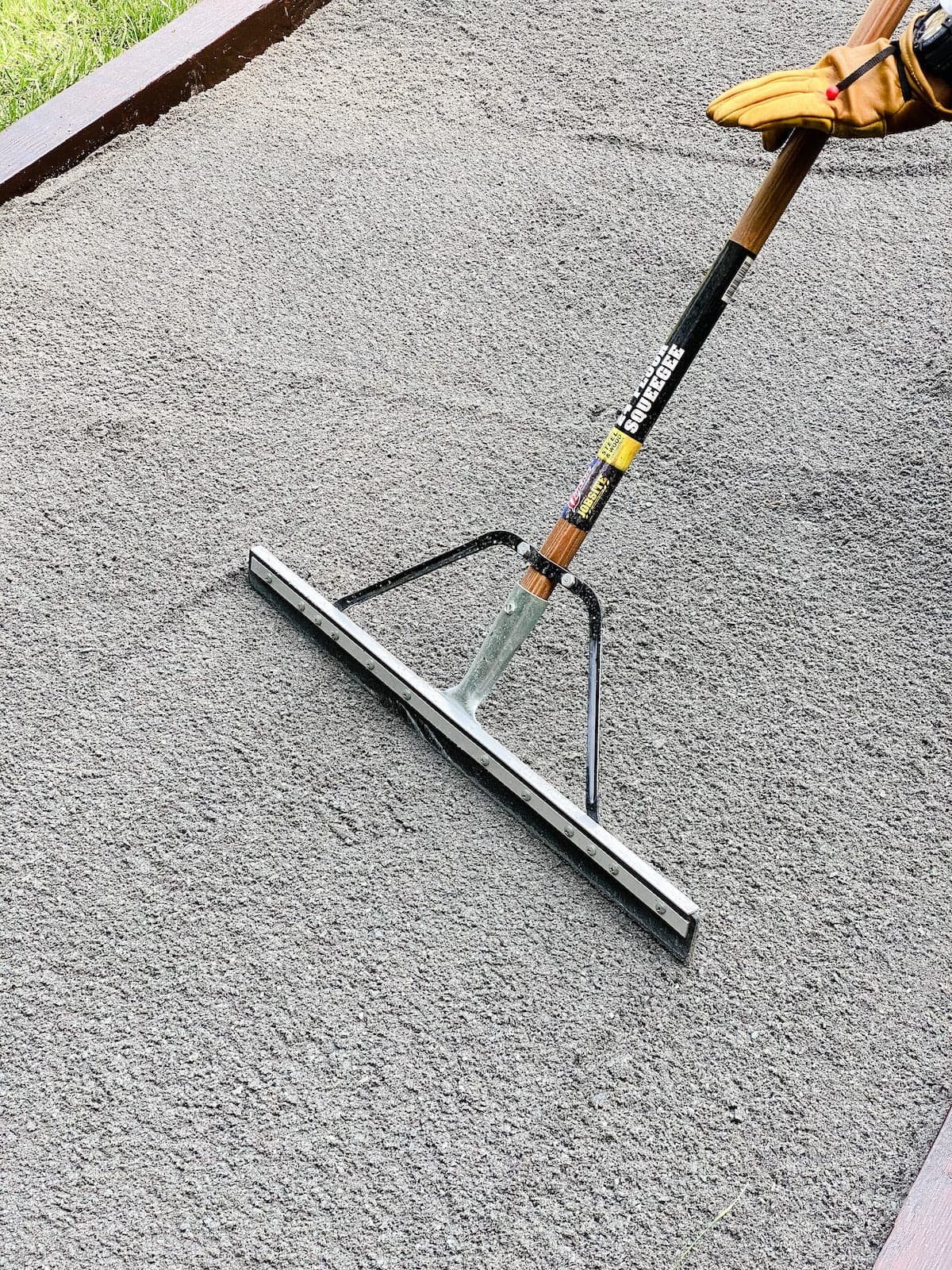 spreading screen washing for bocce ball court