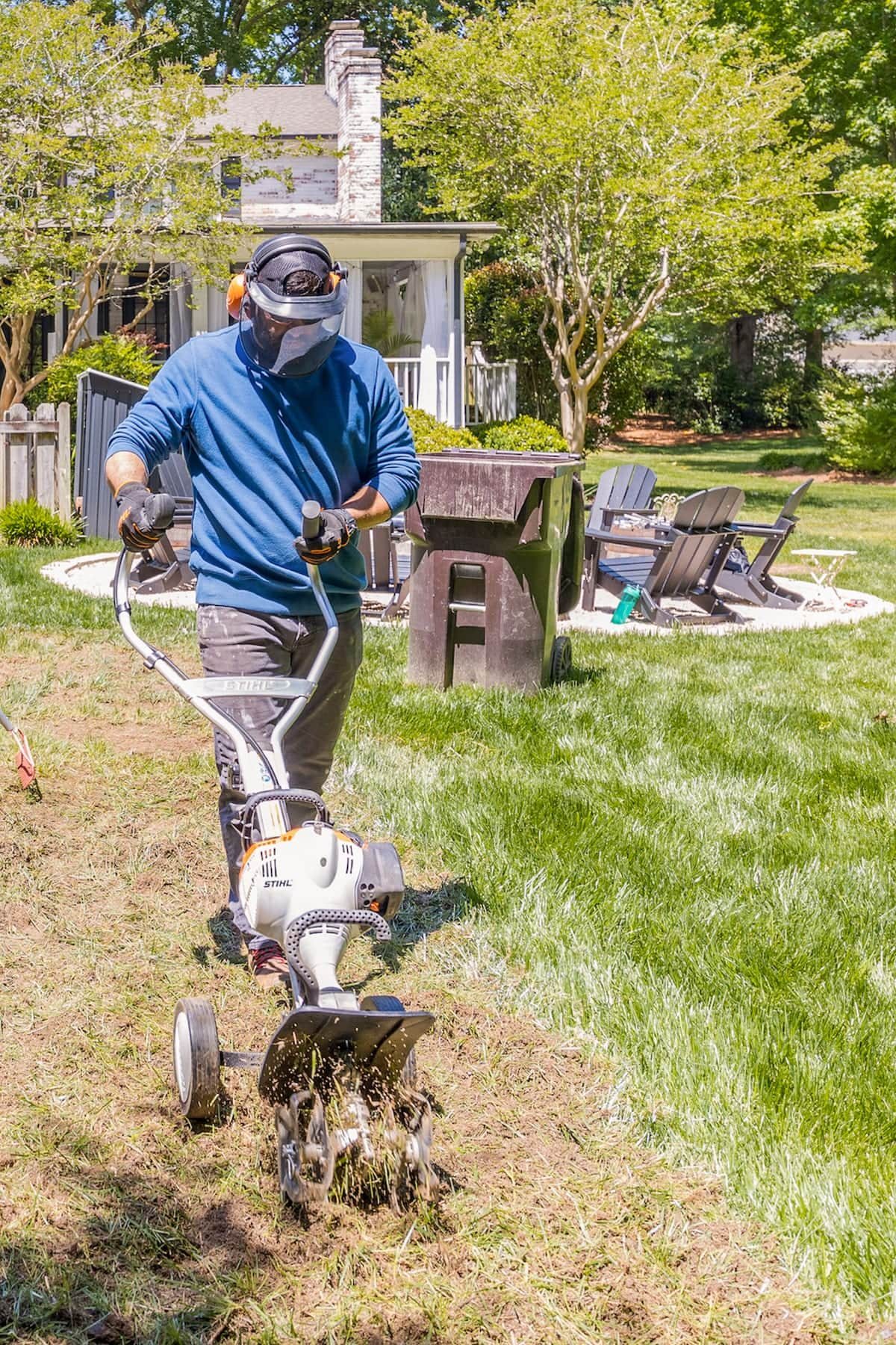 cultivating soil with a STIHL Yard Boss