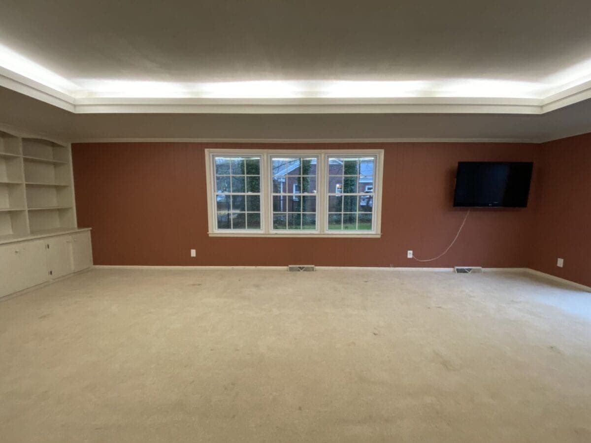 A step-by-step tutorial to build DIY built-in cabinets and a window seat using inexpensive stock kitchen cabinets.