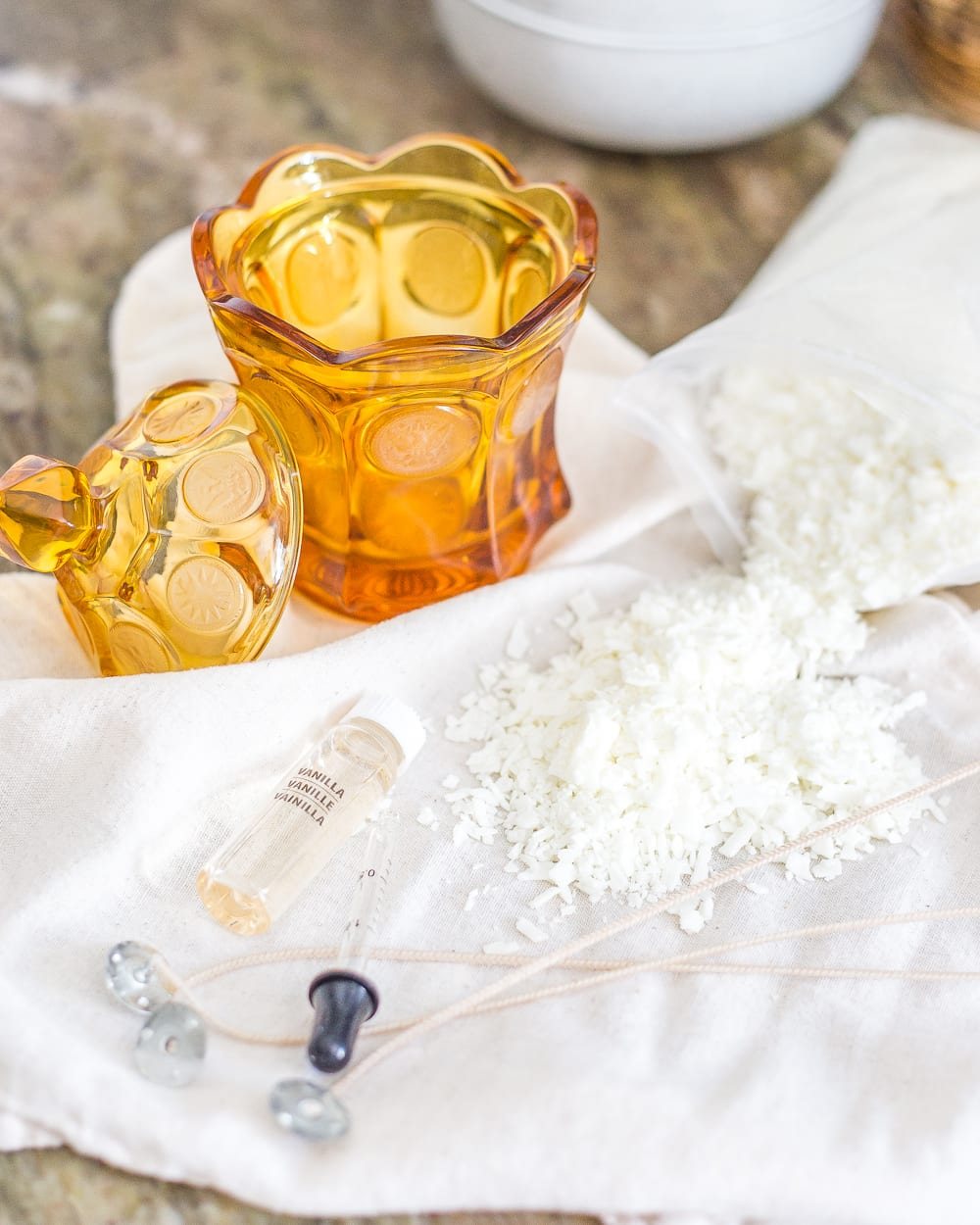 A basic, beginner's step-by-step tutorial for making soy wax candles from repurposed secondhand candy dishes, tea cups, bowls, and jars.
