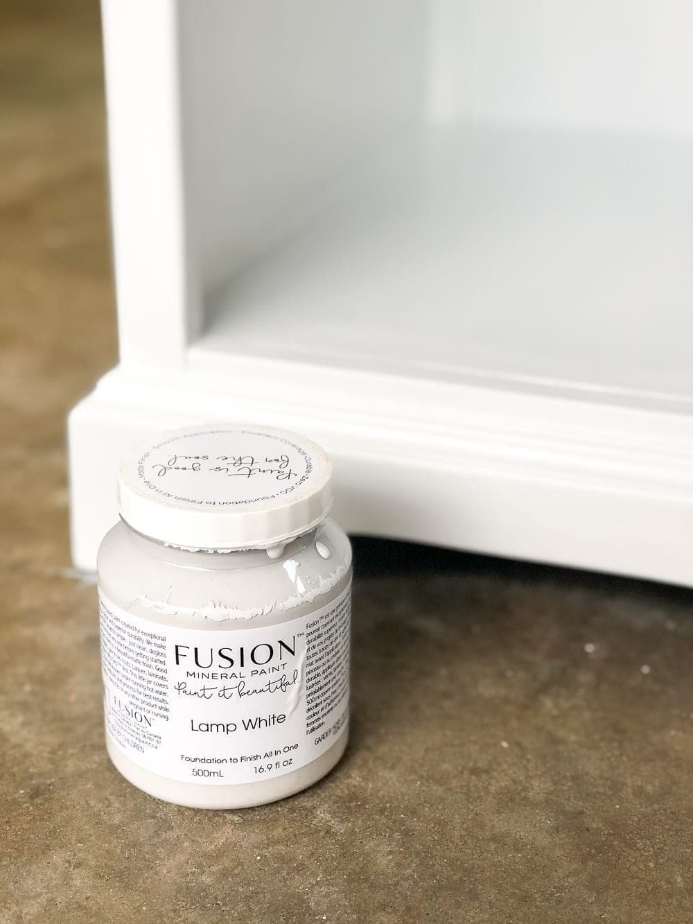 DIY Cane Nightstand Makeover | How to turn a basic glass cabinet nightstand into a designer-worthy cane style that works for both modern and traditional styles.