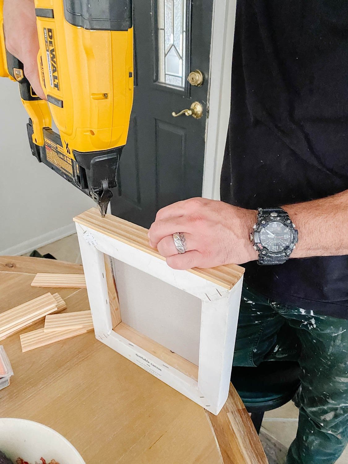 nailing lattice strips to a canvas for a DIY frame