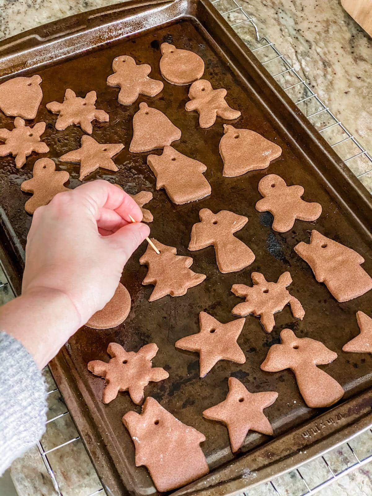 DIY Cinnamon Salt Dough Ornaments | A step-by-step tutorial to make cinnamon salt dough ornaments that look just like gingerbread cookies, smell amazing, and last for years.