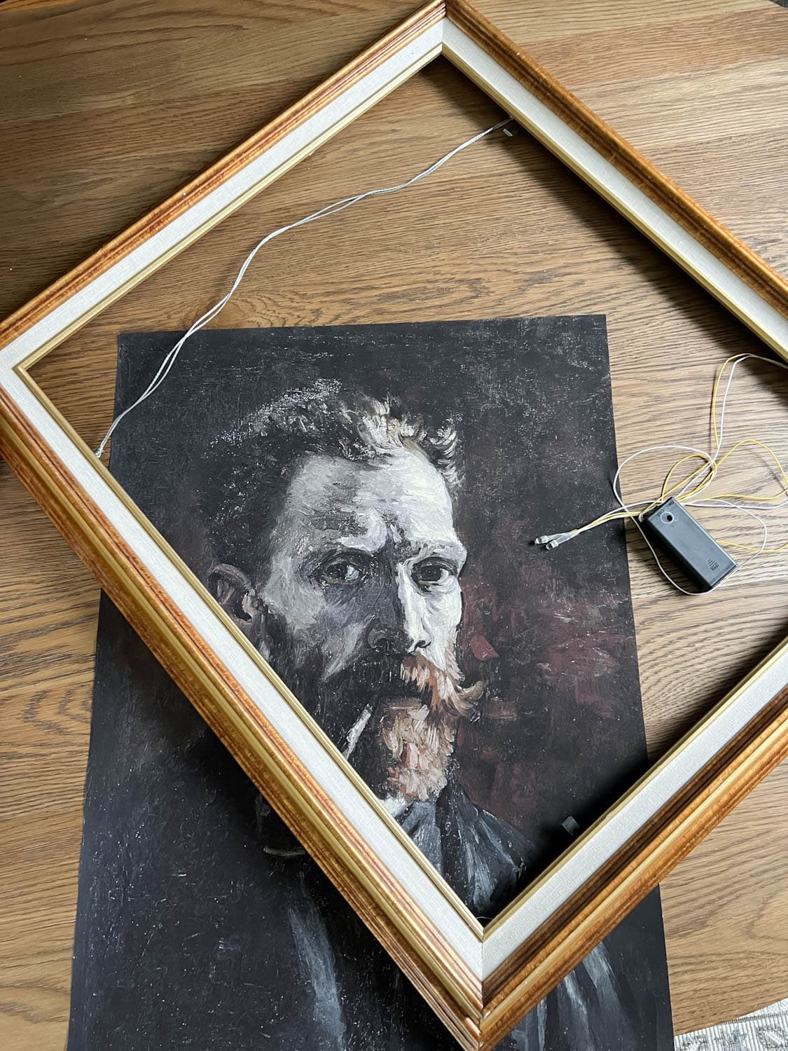 thrifted picture frame, art print, and battery operated lights
