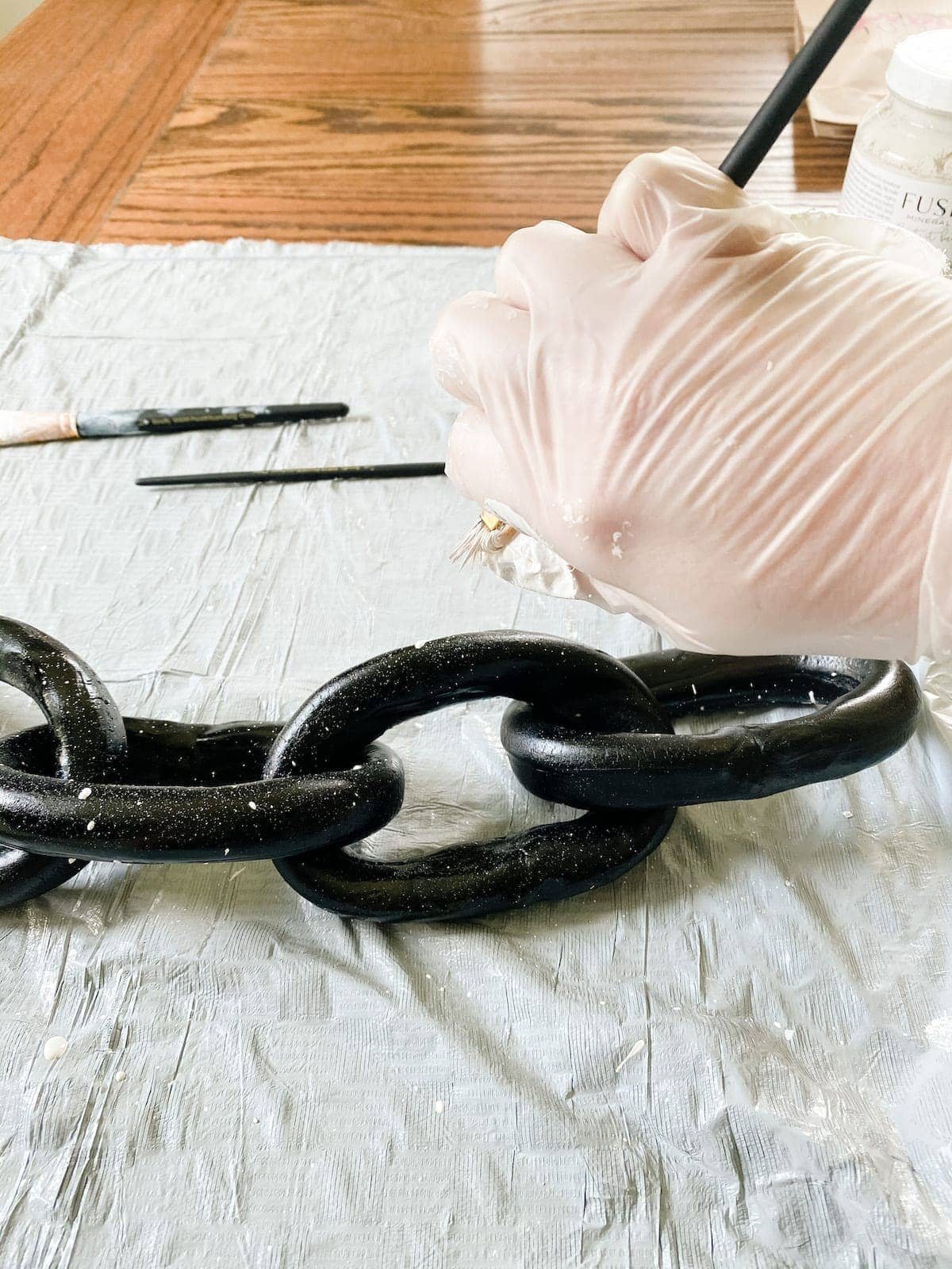 air dry clay sculpted and painted to look like a decorative chain