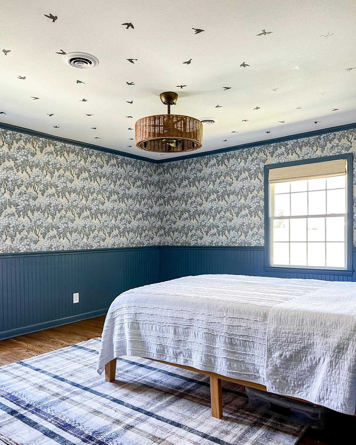 DIY bird wallpaper ceiling in a bedroom using vinyl sticker decals