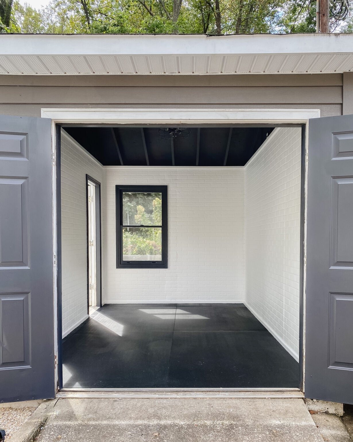 gym shed with brick walls and black ceiling